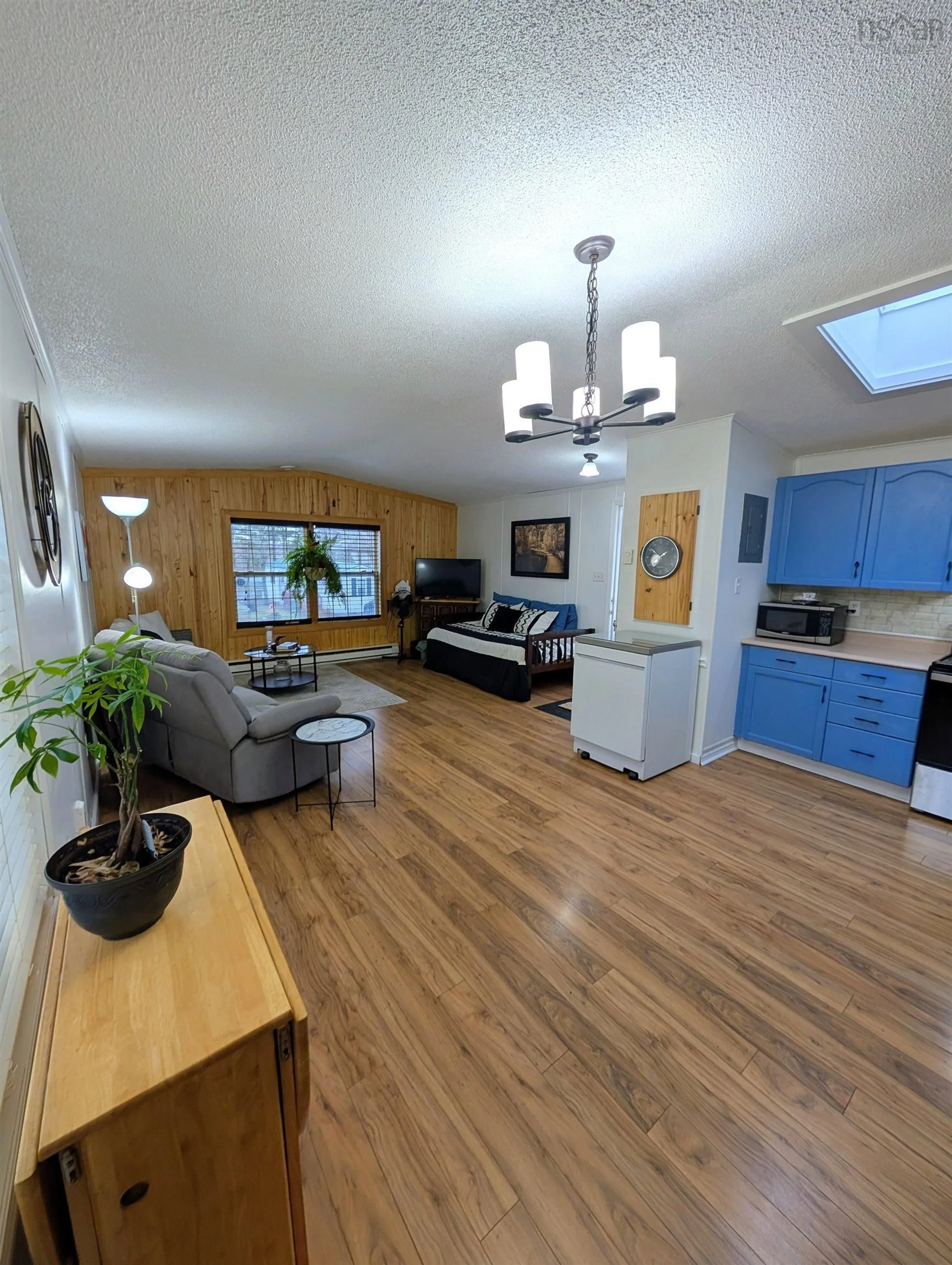 Living room with furniture, wood/laminate floor for 8 Summer Cres, Bridgewater Nova Scotia B4V 3P3