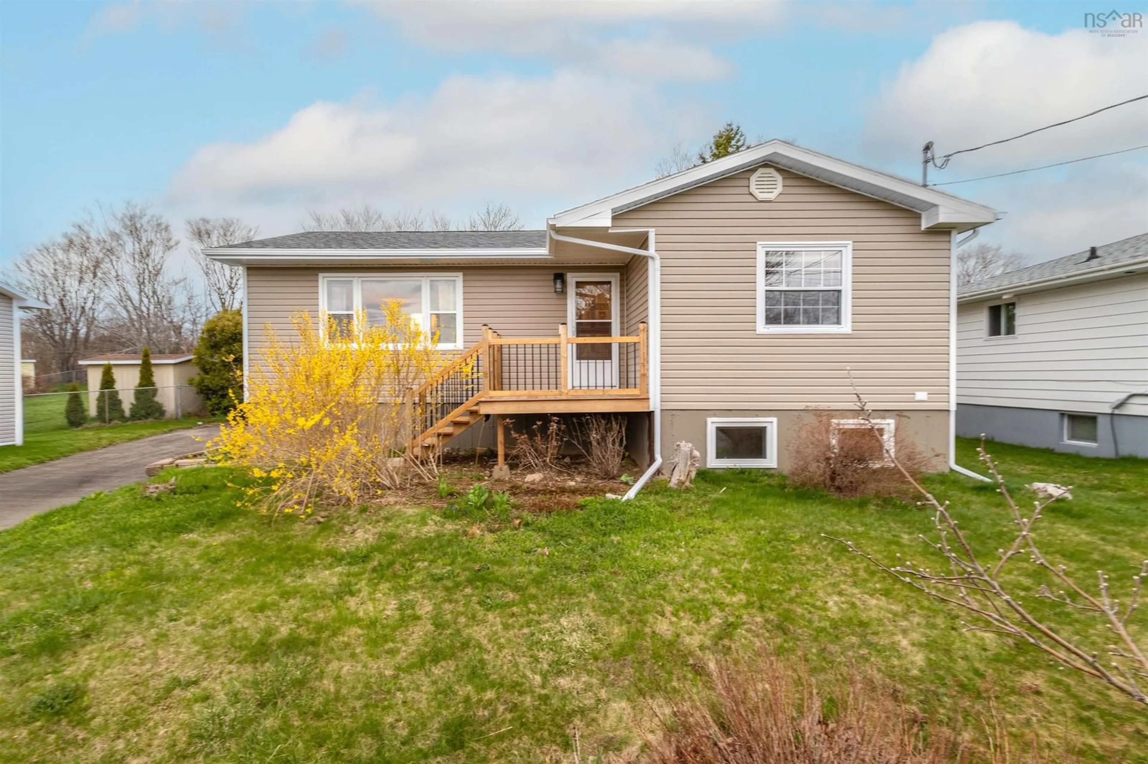 Home with vinyl exterior material, street for 42 Holic Ave, North Sydney Nova Scotia B2A 3R8