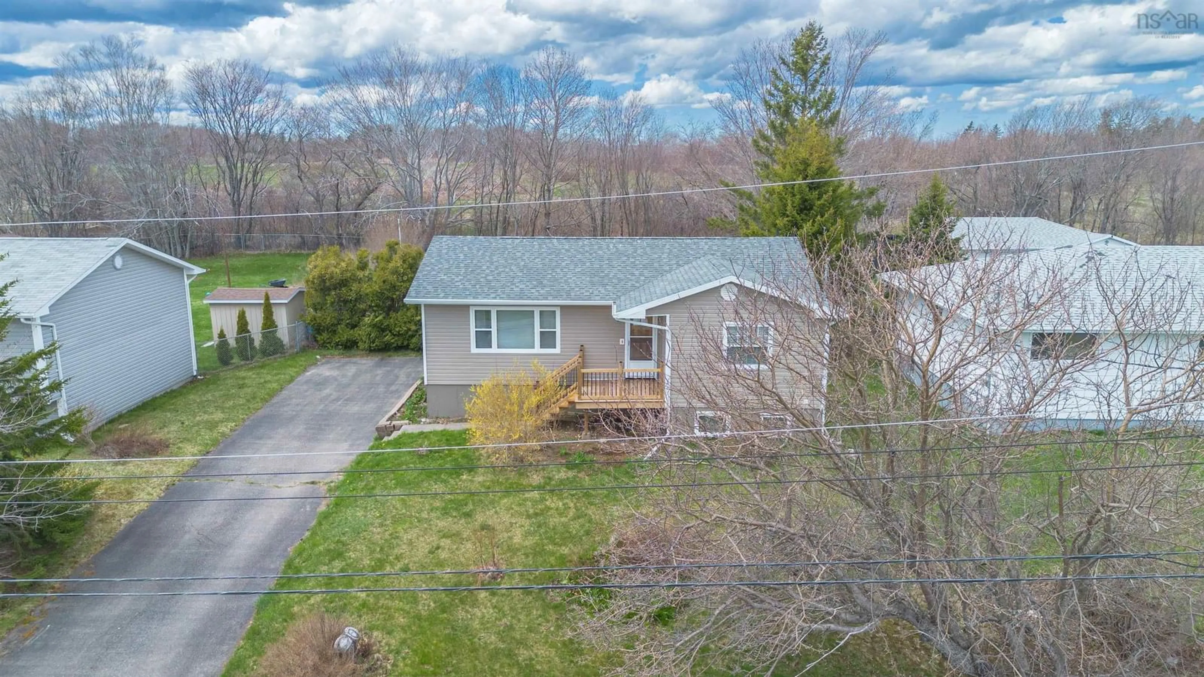 A pic from outside/outdoor area/front of a property/back of a property/a pic from drone, street for 42 Holic Ave, North Sydney Nova Scotia B2A 3R8