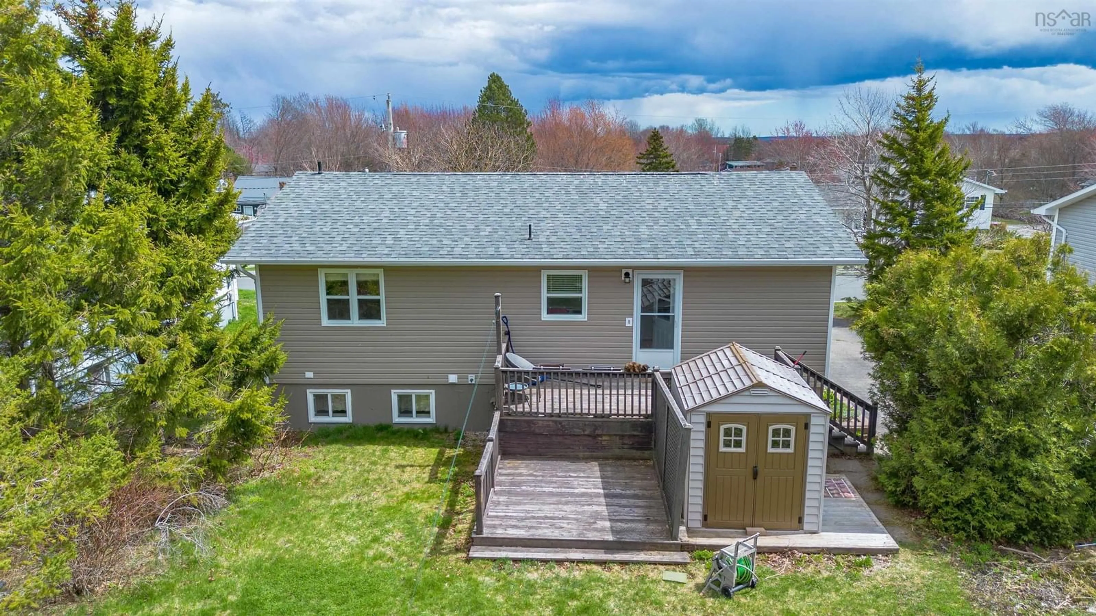 A pic from outside/outdoor area/front of a property/back of a property/a pic from drone, water/lake/river/ocean view for 42 Holic Ave, North Sydney Nova Scotia B2A 3R8