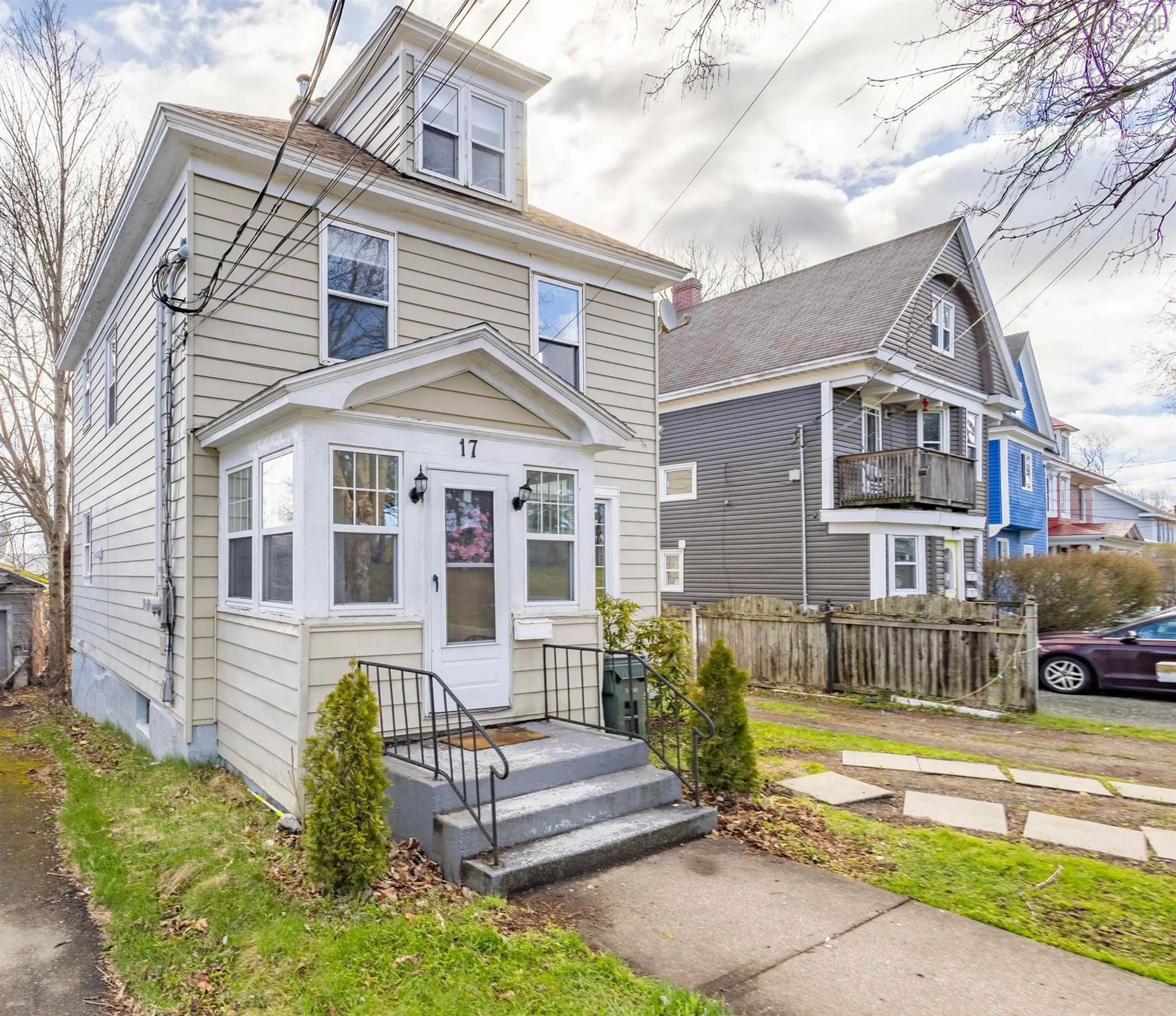 Home with vinyl exterior material, street for 17 George St, Sydney Nova Scotia B1P 1H3