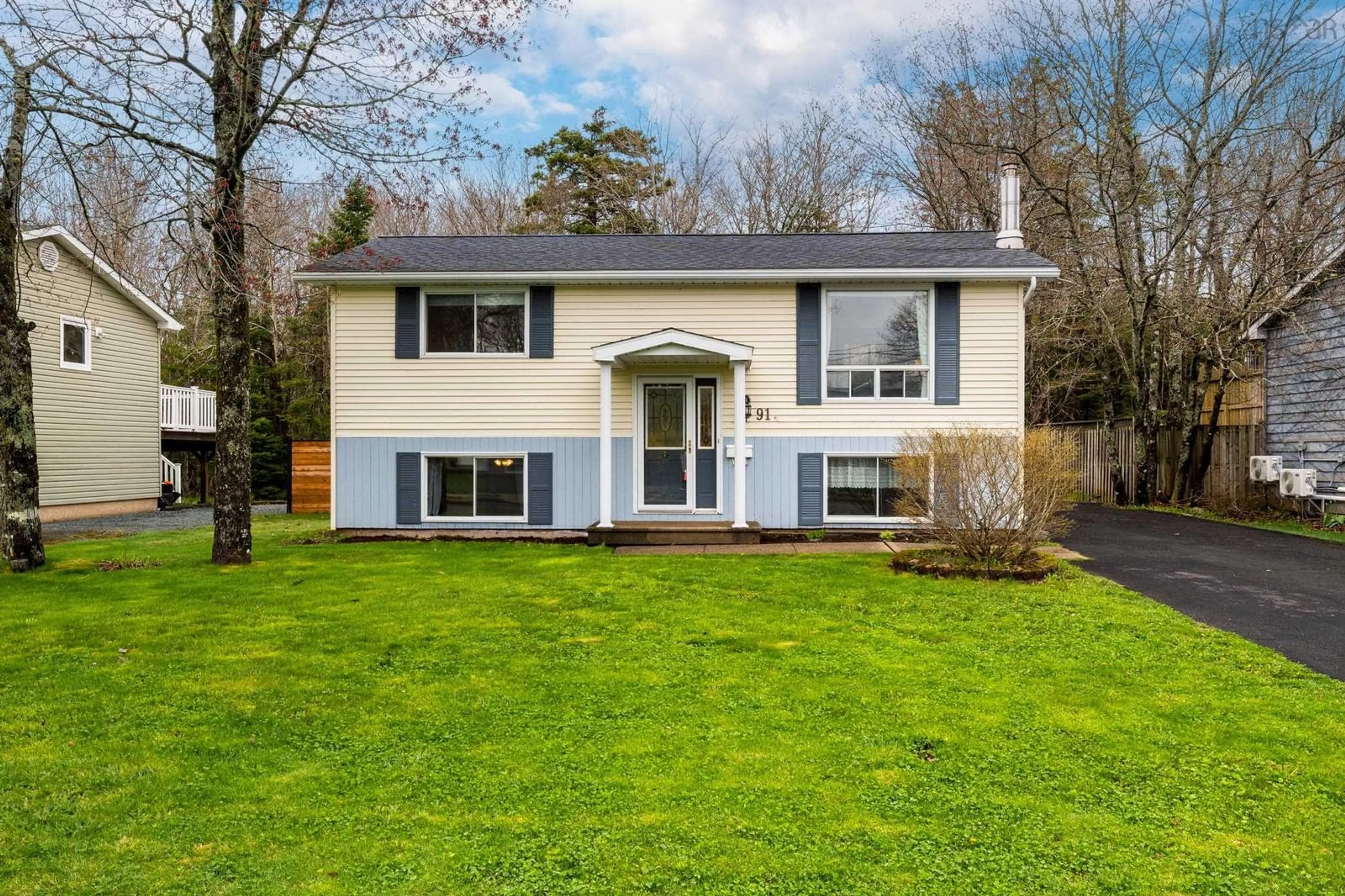 Home with vinyl exterior material, street for 91 Cavalier Dr, Lower Sackville Nova Scotia B4C 3K6