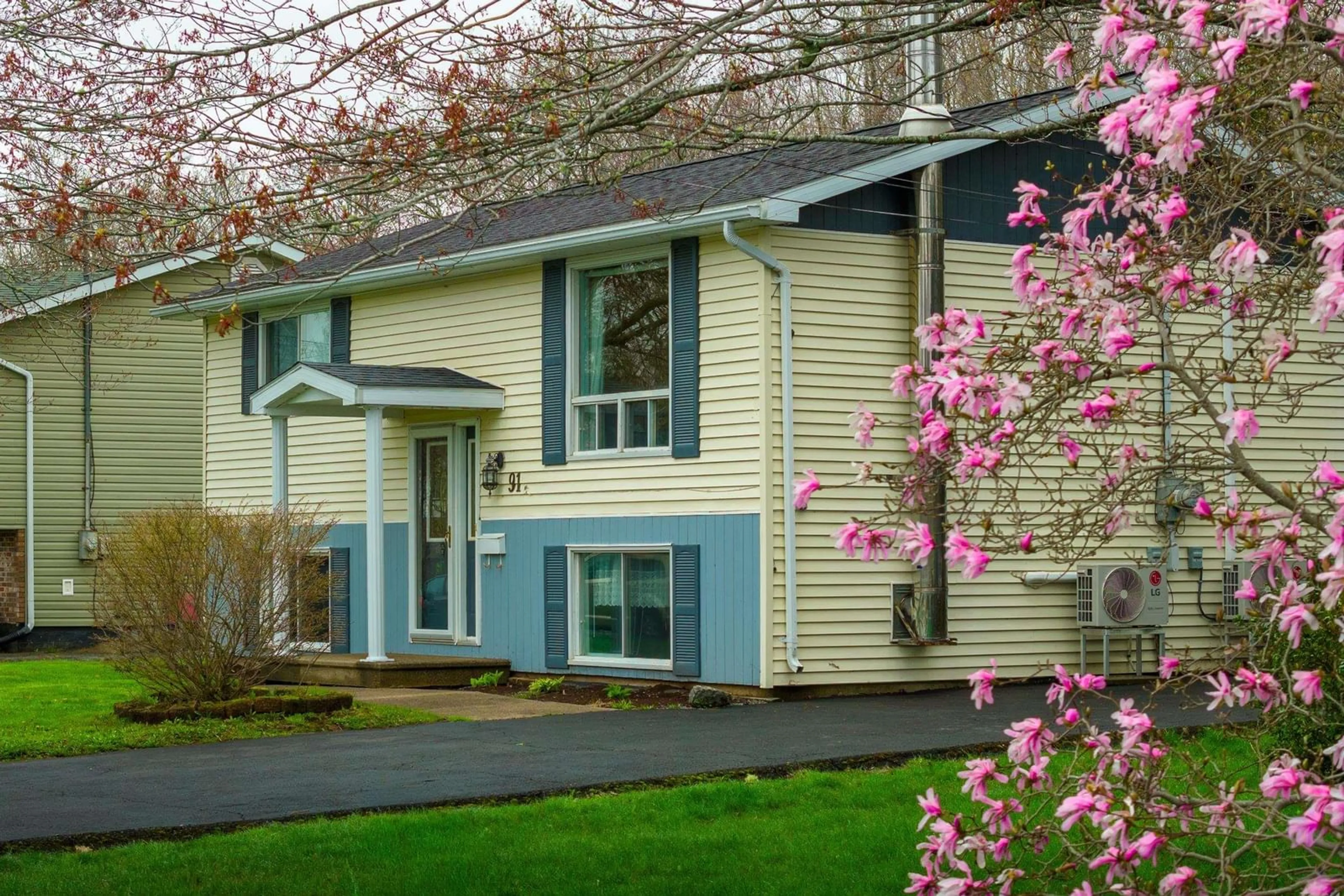 Home with vinyl exterior material, street for 91 Cavalier Dr, Lower Sackville Nova Scotia B4C 3K6