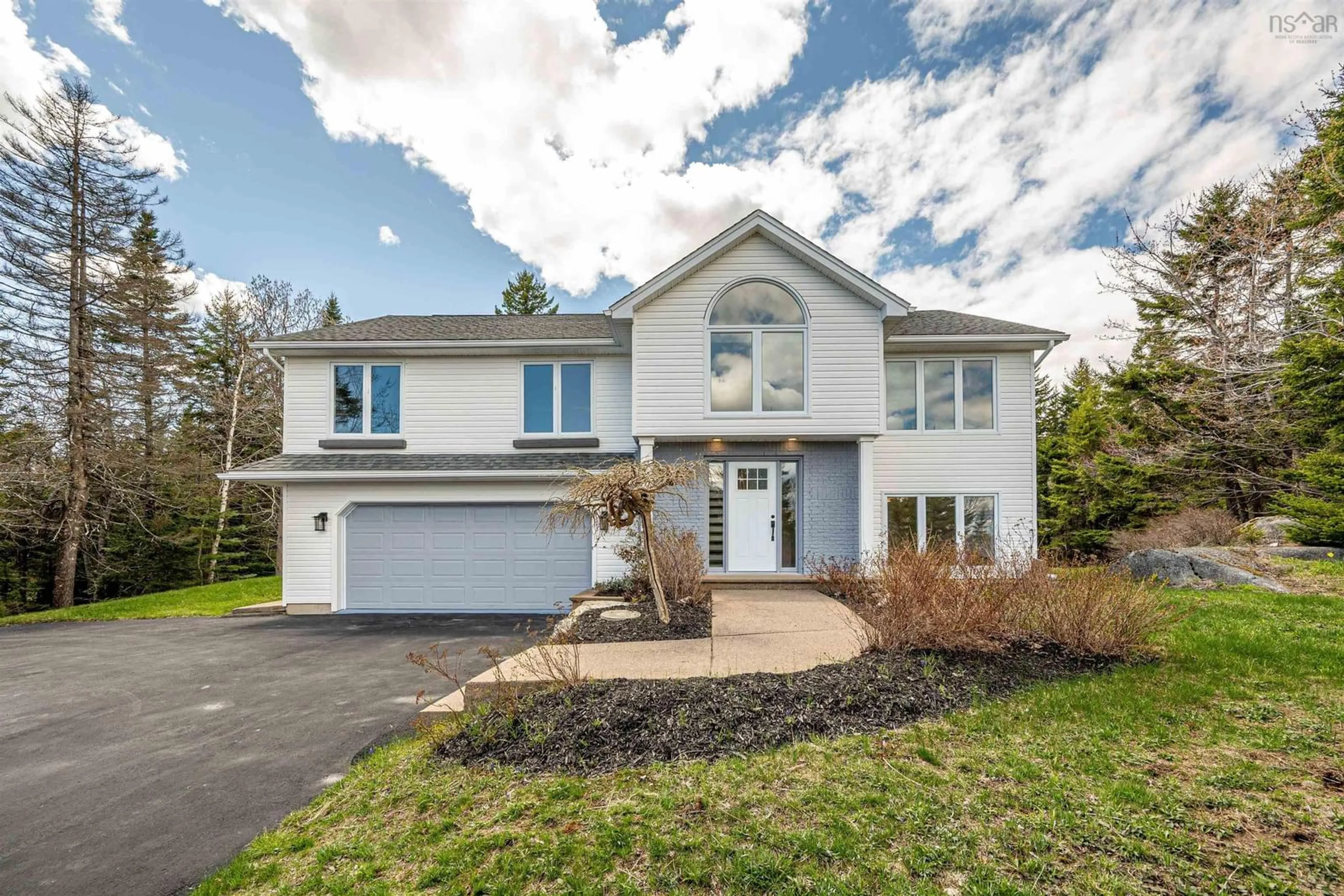 Home with vinyl exterior material, street for 73 Lakefront Dr, Hammonds Plains Nova Scotia B4B 1L4