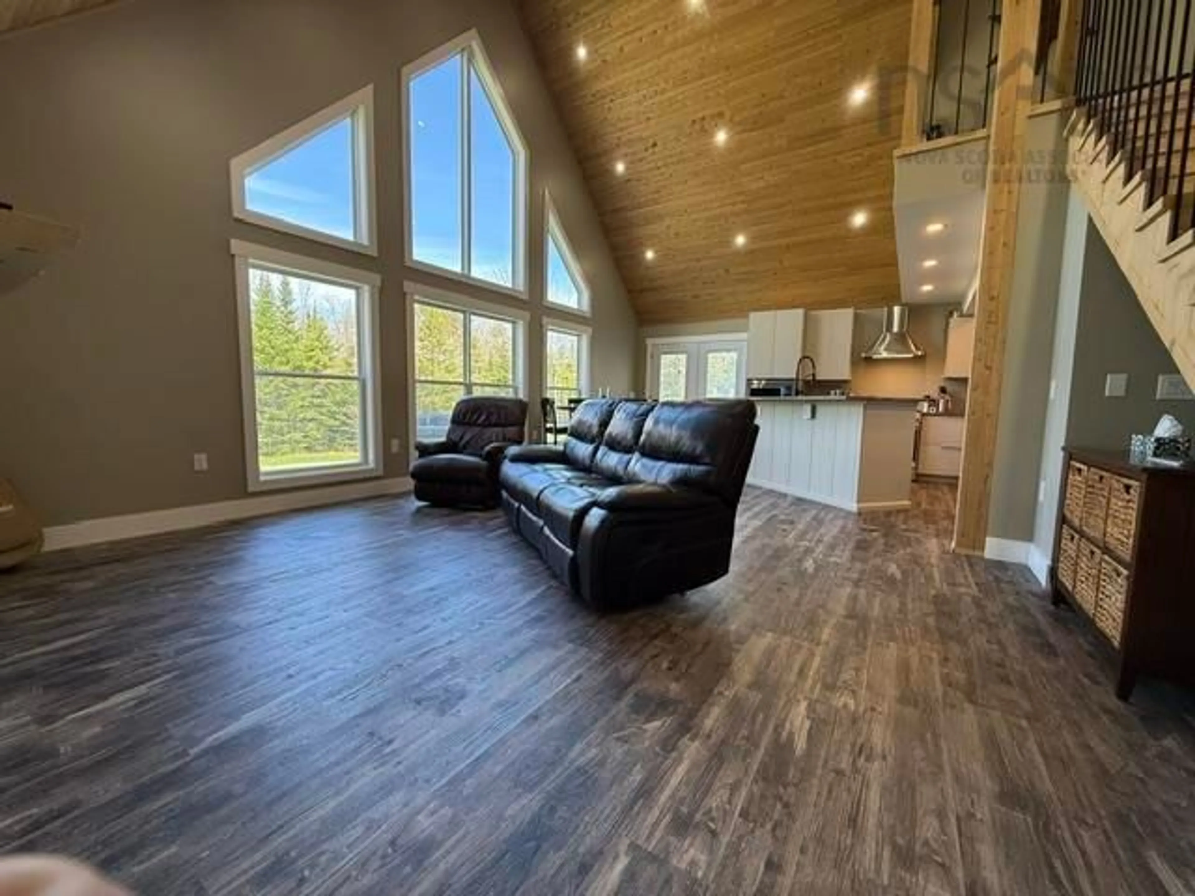 Living room with furniture, wood/laminate floor for 660 St. Andrews River Rd, Shubenacadie East Nova Scotia B0N 2H0