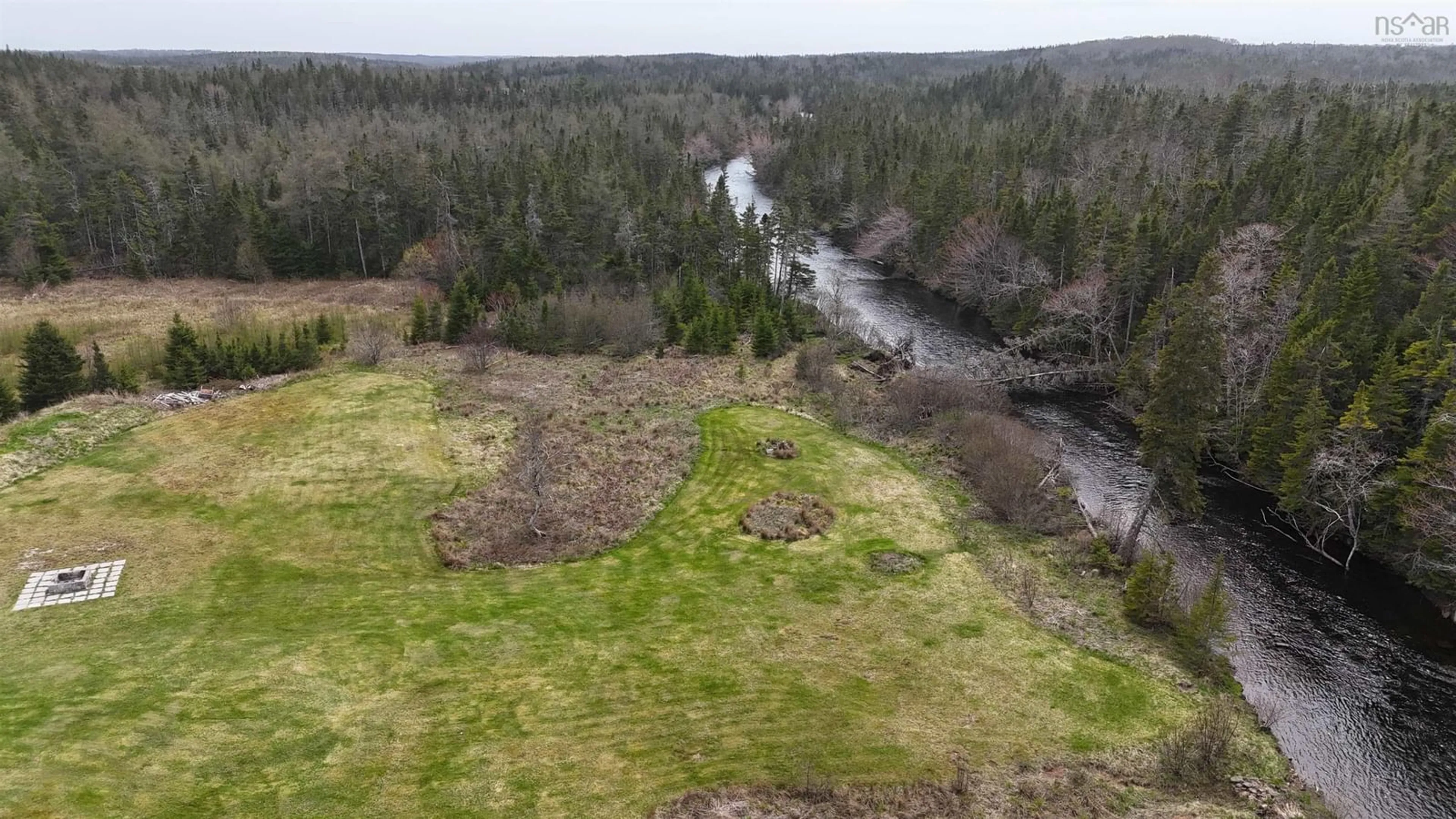 A pic from outside/outdoor area/front of a property/back of a property/a pic from drone, water/lake/river/ocean view for 1235 Loch Lomond Rd, Grand River Falls Nova Scotia B0E 1M0