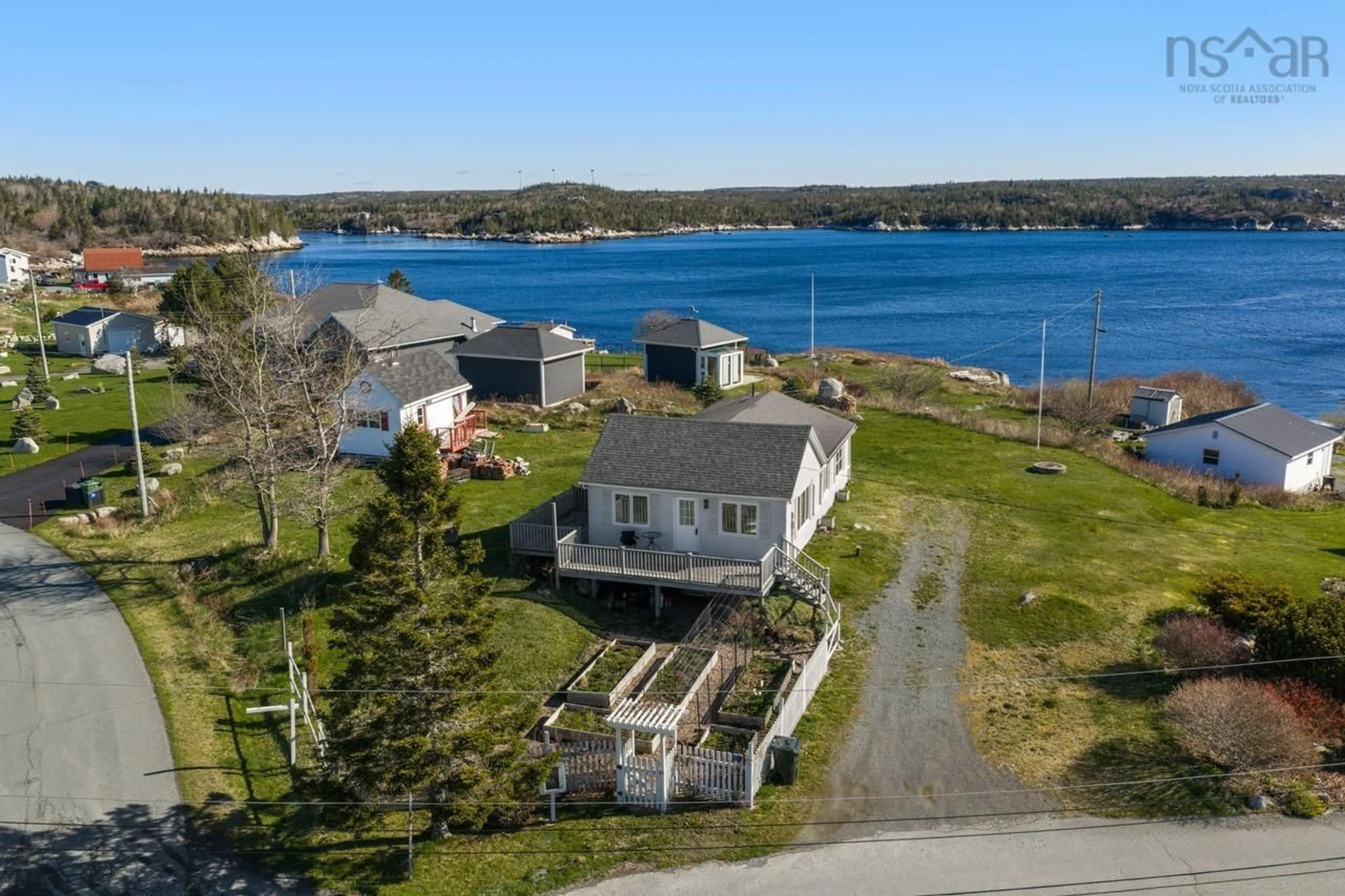 A pic from outside/outdoor area/front of a property/back of a property/a pic from drone, water/lake/river/ocean view for 10 Terence Bay Wharf Rd, Terence Bay Nova Scotia B3T 1Y3