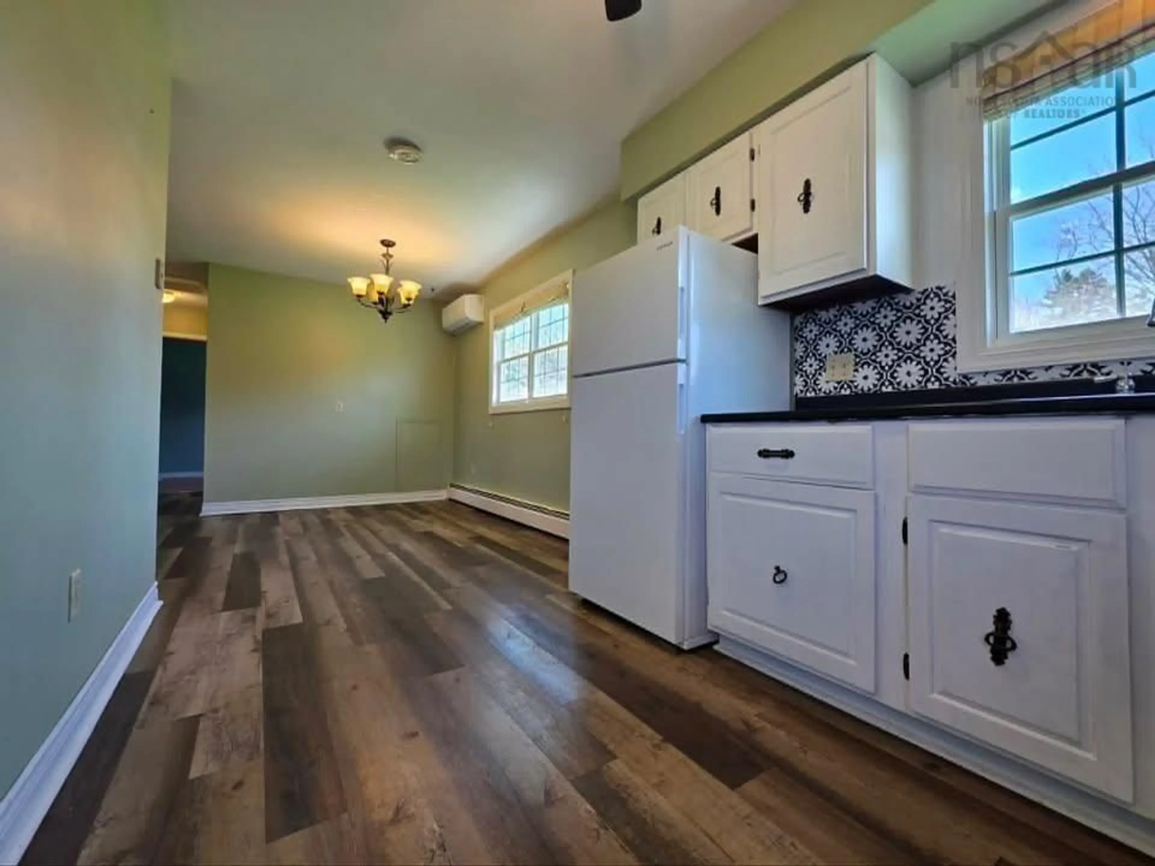 Open concept kitchen, wood/laminate floor for 15 Montery Dr, Salmon River Nova Scotia B2N 5S3