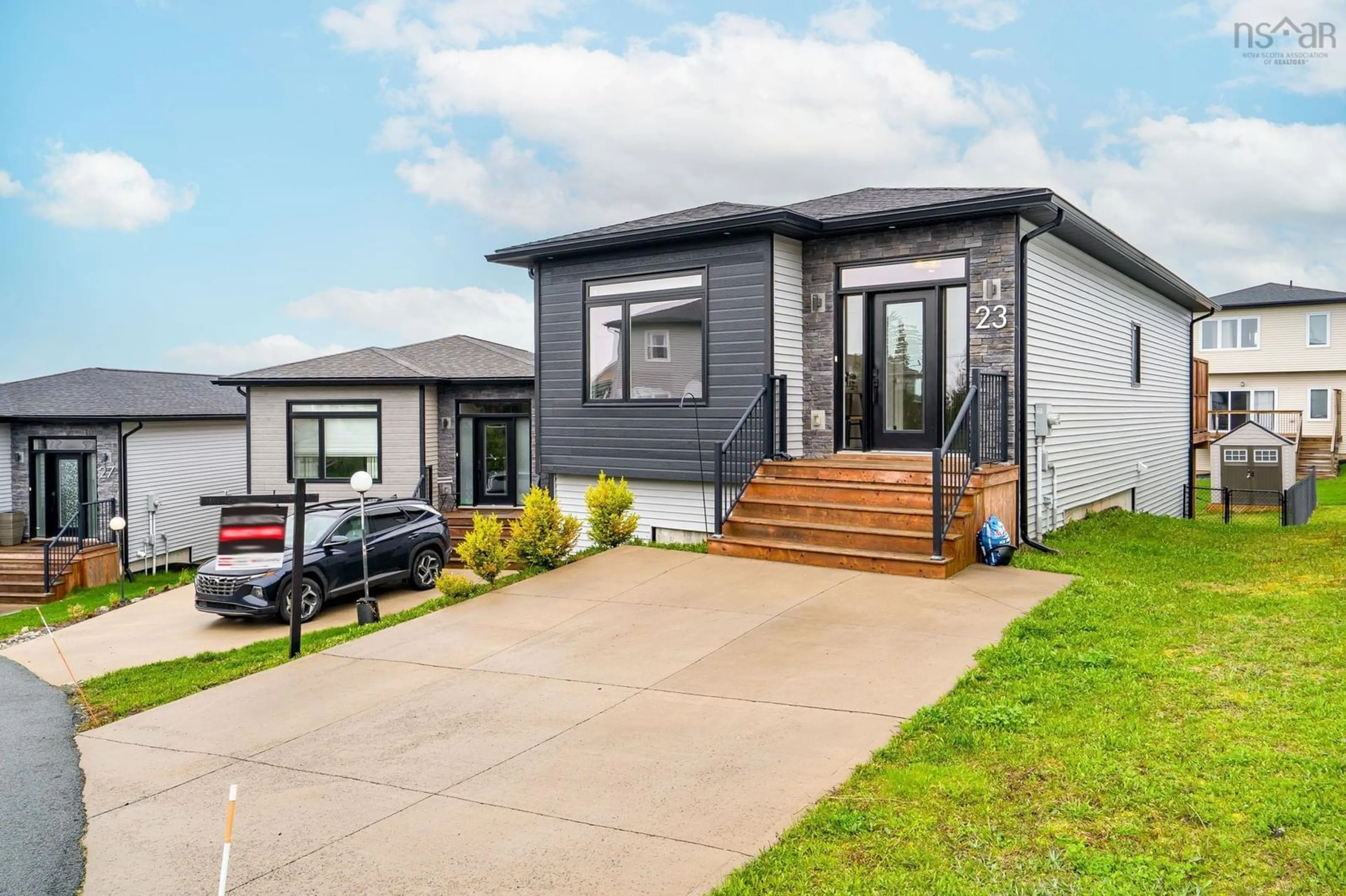 Home with vinyl exterior material, street for 23 Thorngrove Lane, Timberlea Nova Scotia B3T 0K1