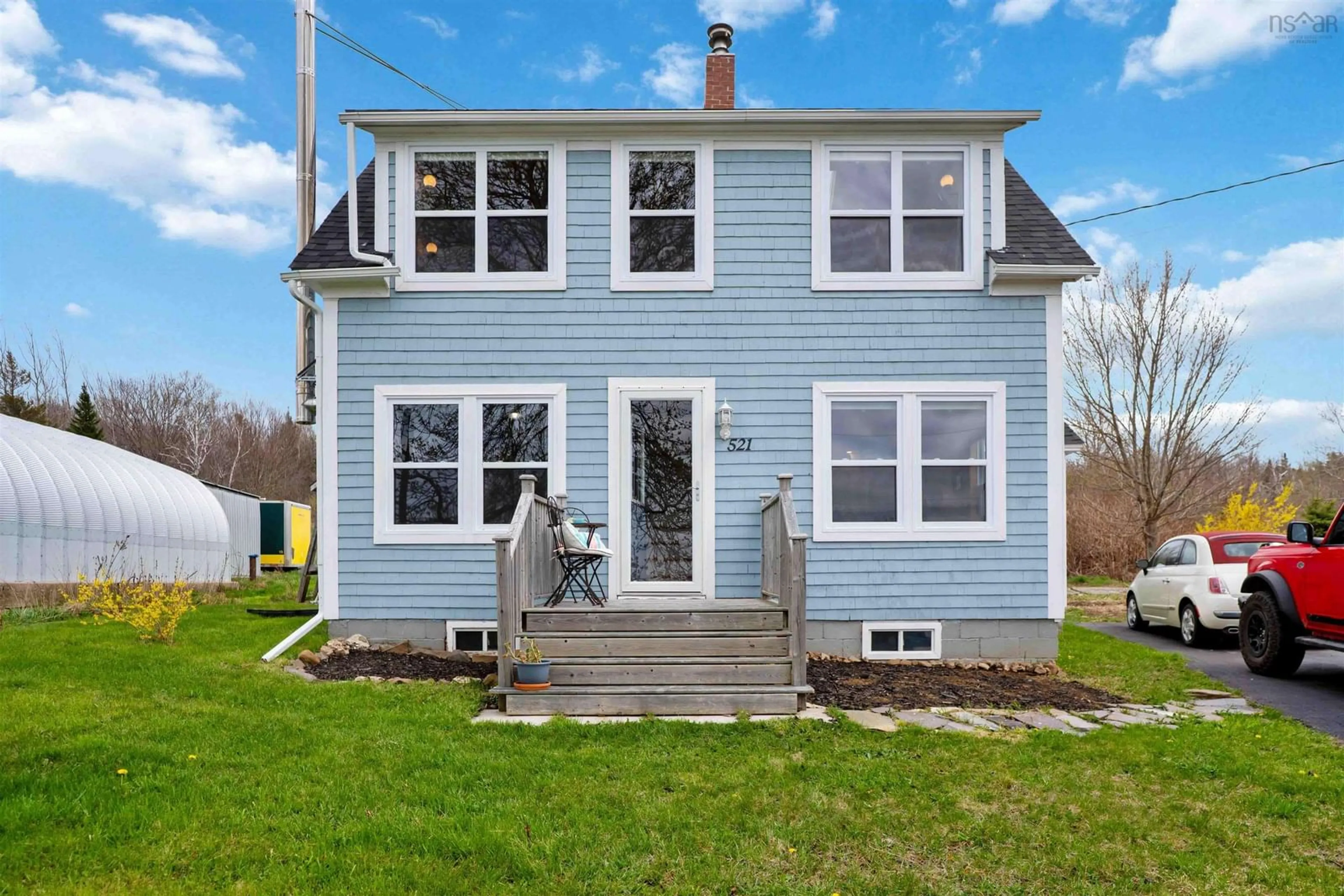 Home with vinyl exterior material, street for 521 Granville Rd, Victoria Beach Nova Scotia B0S 1K0