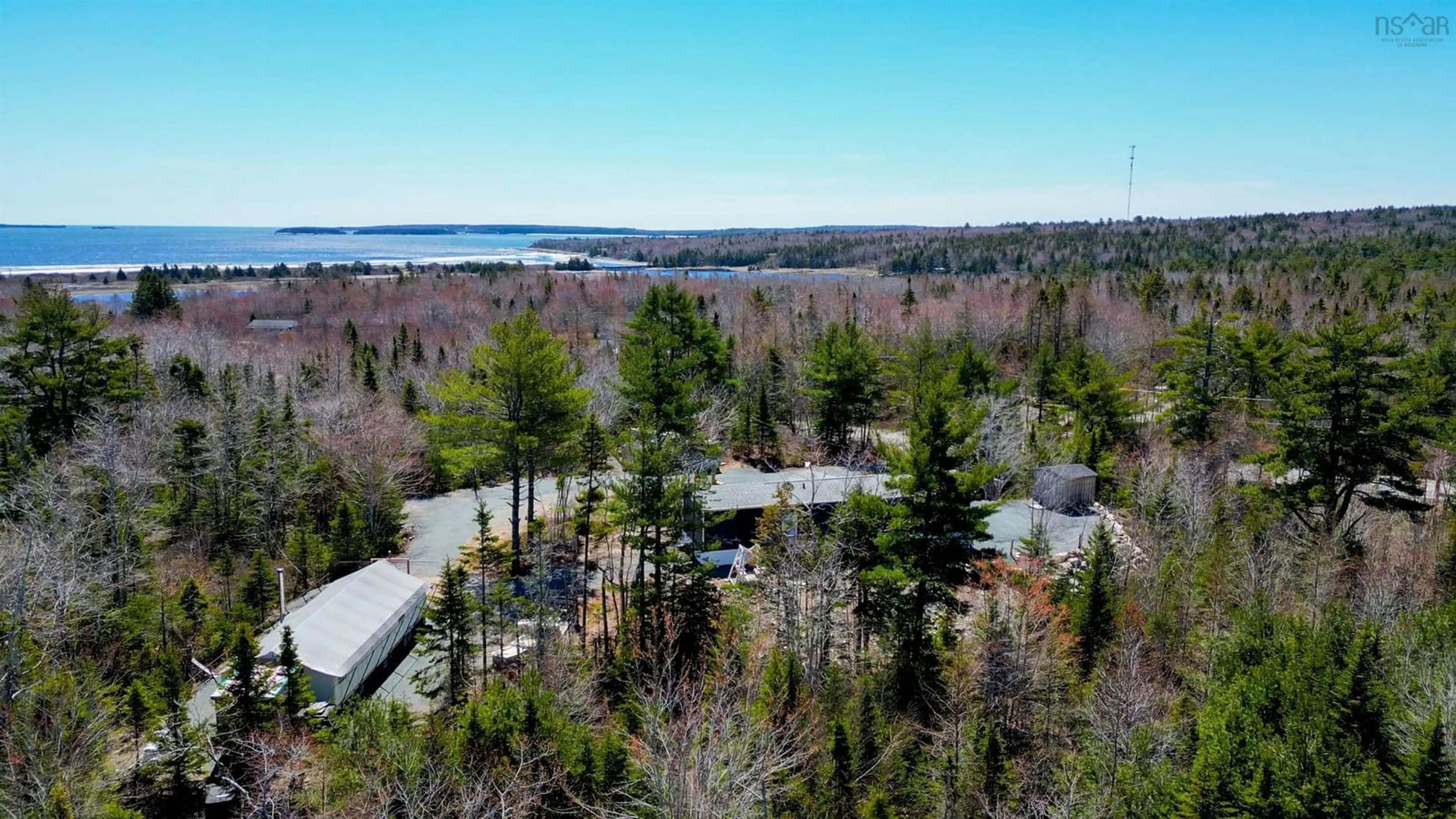 A pic from outside/outdoor area/front of a property/back of a property/a pic from drone, water/lake/river/ocean view for 7714 Highway 3, Summerville Centre Nova Scotia B0T 1T0