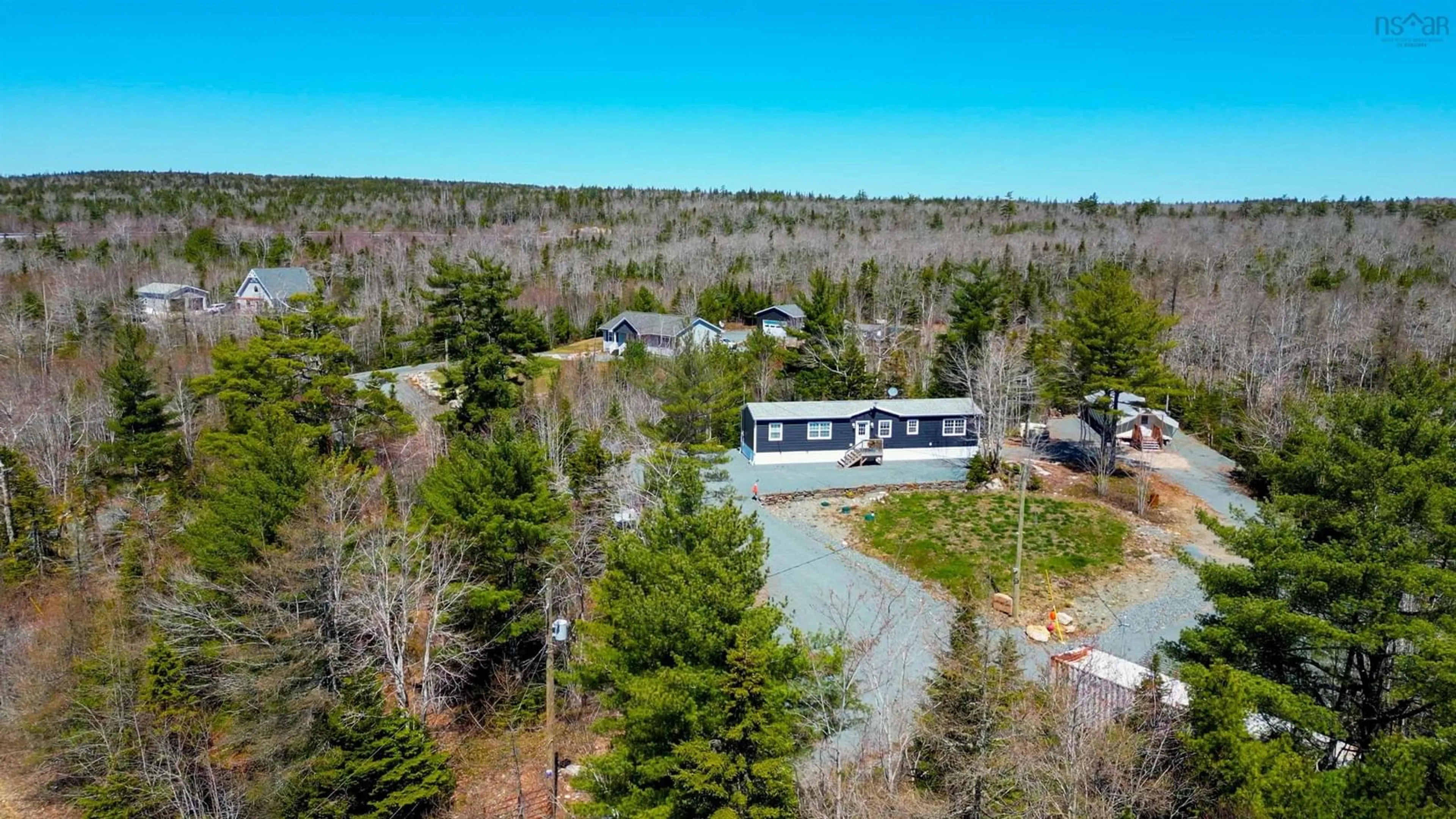 A pic from outside/outdoor area/front of a property/back of a property/a pic from drone, forest/trees view for 7714 Highway 3, Summerville Centre Nova Scotia B0T 1T0