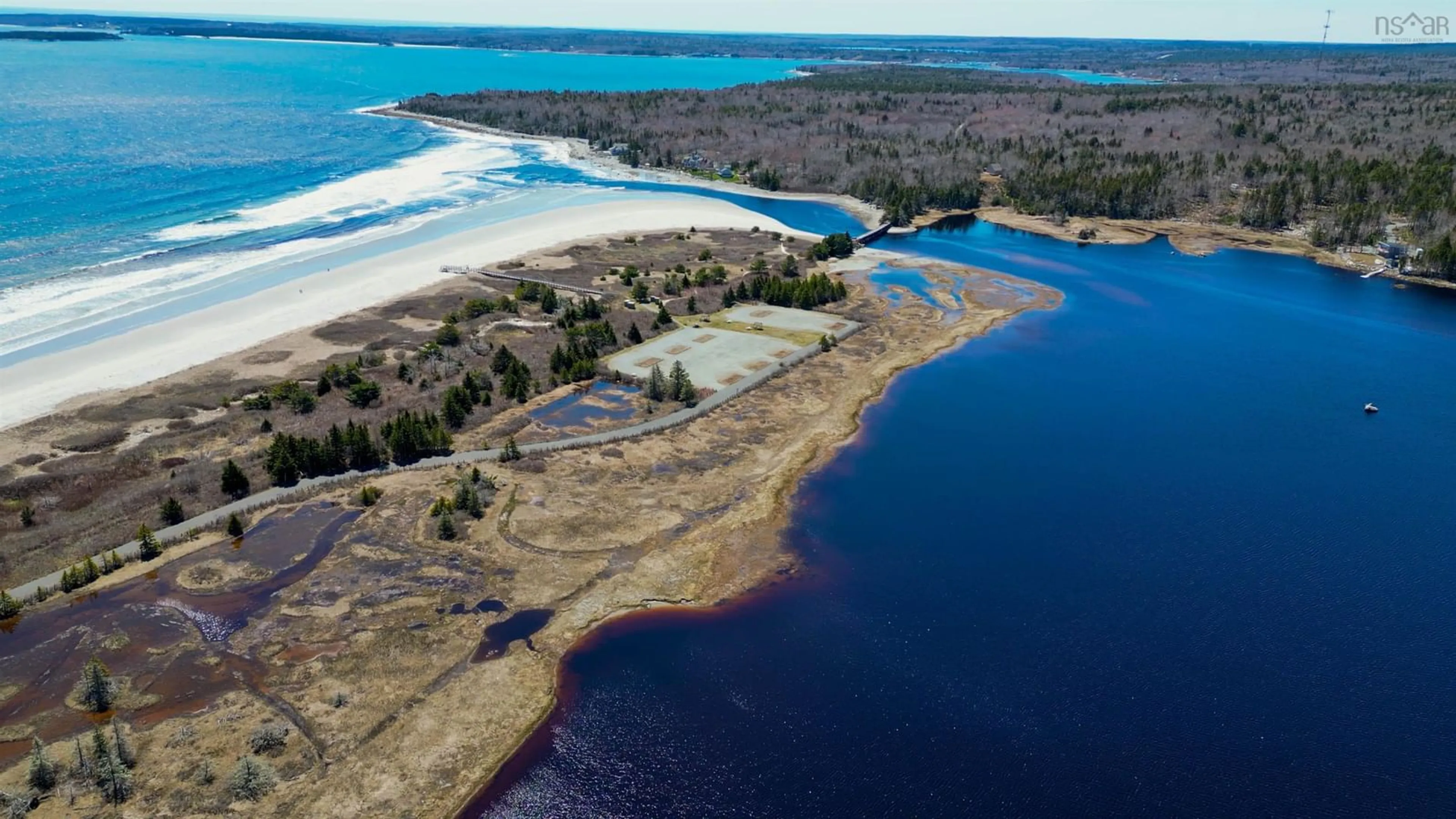 A pic from outside/outdoor area/front of a property/back of a property/a pic from drone, water/lake/river/ocean view for 7714 Highway 3, Summerville Centre Nova Scotia B0T 1T0