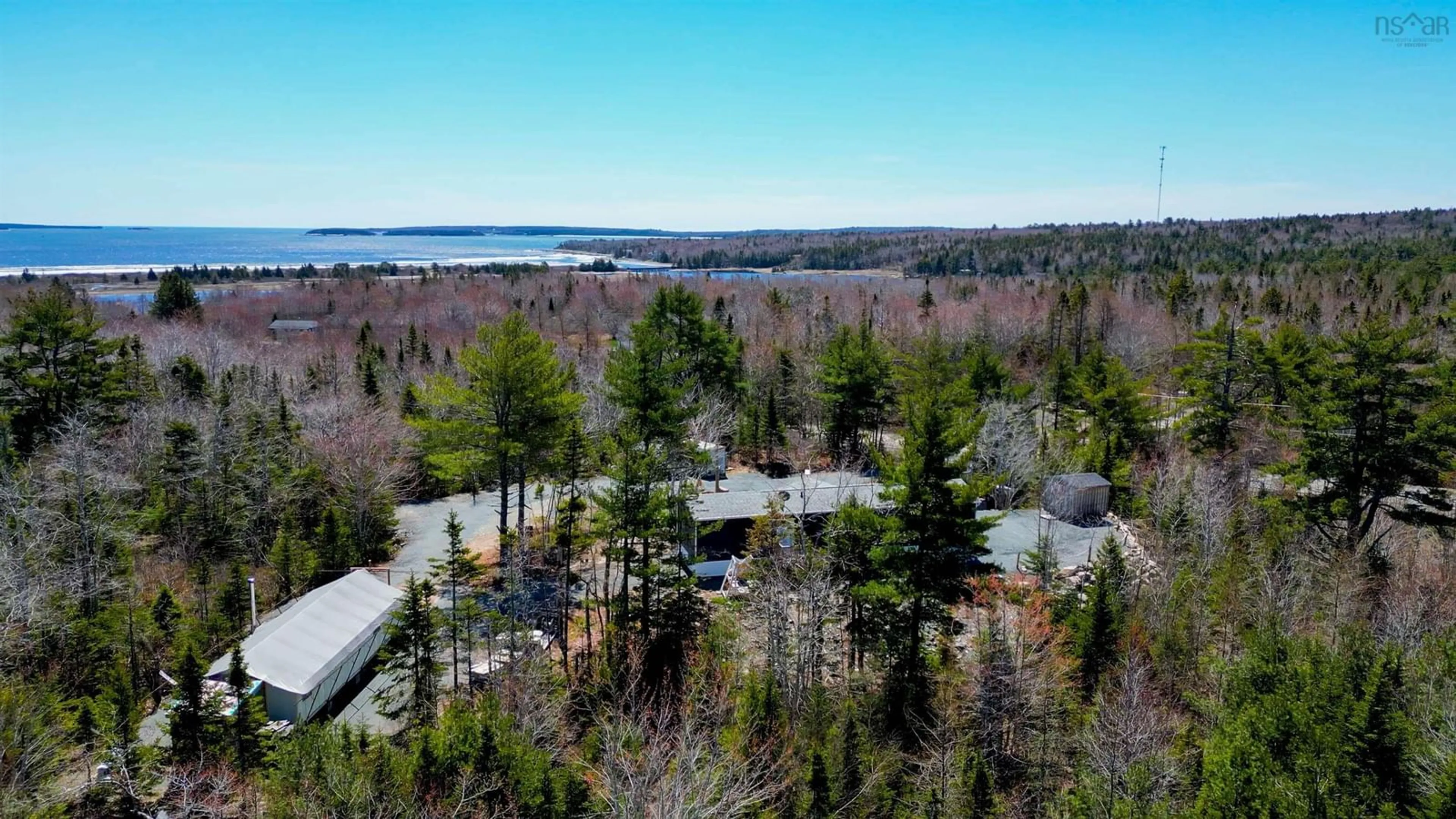 A pic from outside/outdoor area/front of a property/back of a property/a pic from drone, water/lake/river/ocean view for 7714 Highway 3, Summerville Centre Nova Scotia B0T 1T0