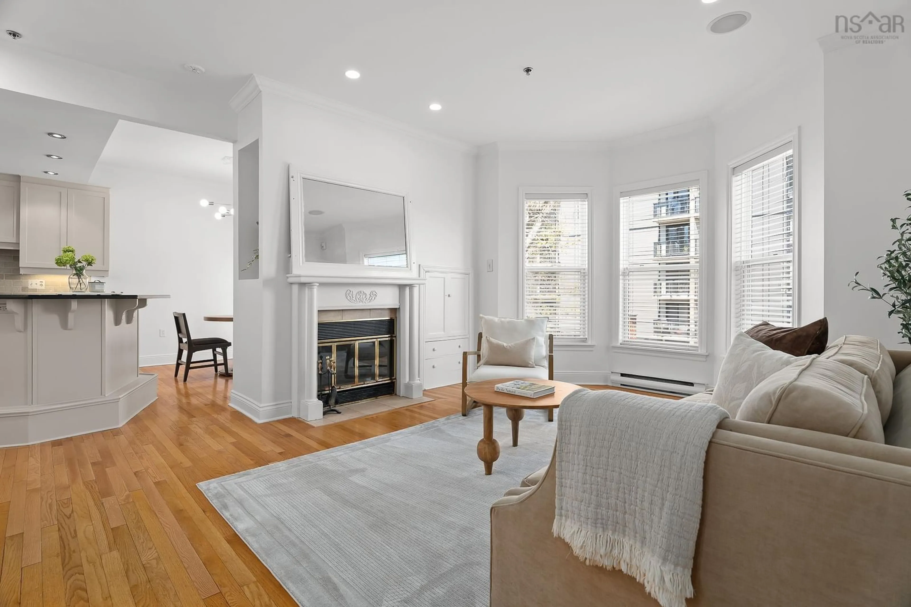 Living room with furniture, wood/laminate floor for 1049 South Park St #5, Halifax Nova Scotia B3H 2W5