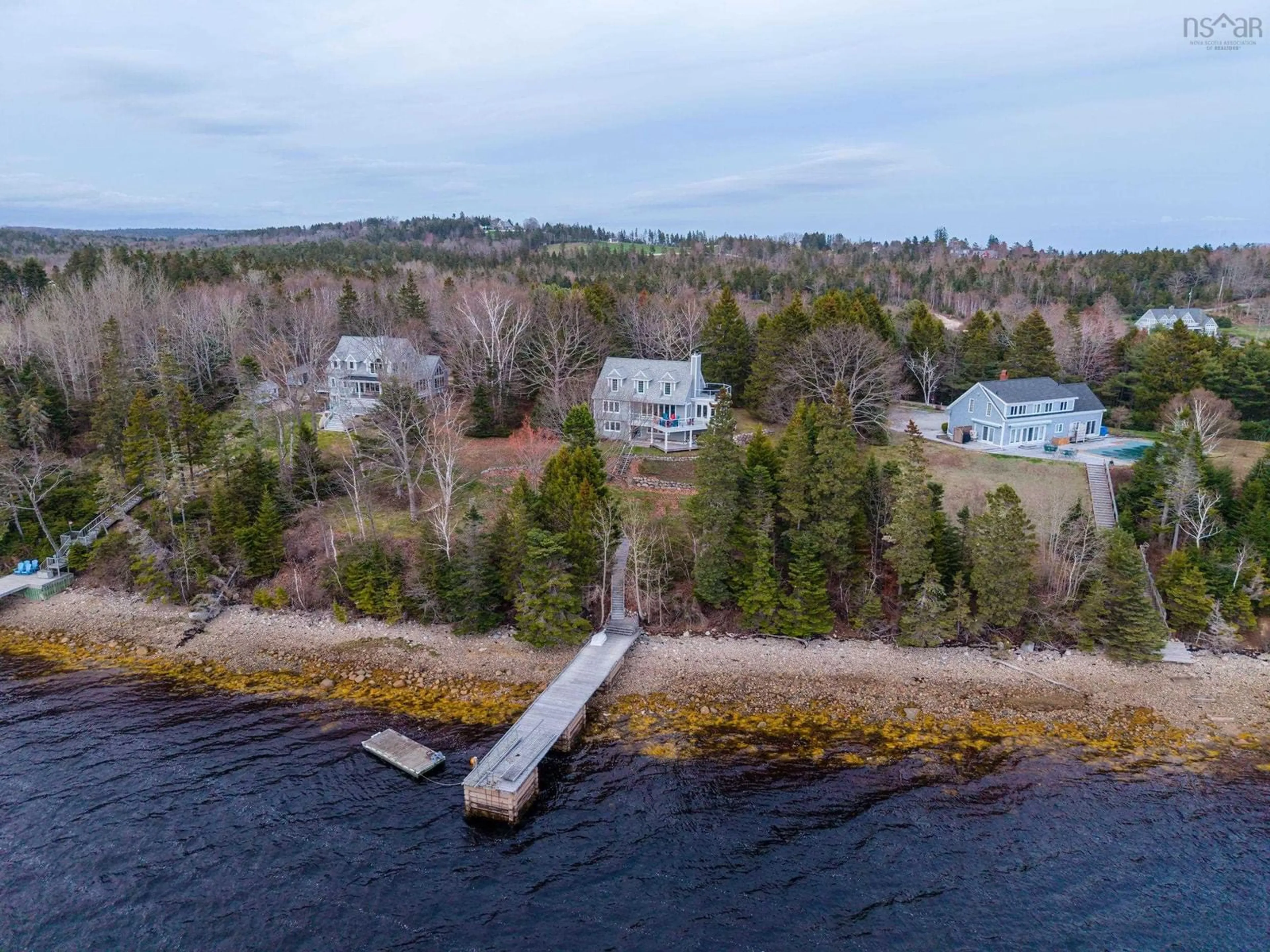 A pic from outside/outdoor area/front of a property/back of a property/a pic from drone, water/lake/river/ocean view for 152 Half Moon Cove Rd, Marriotts Cove Nova Scotia B0J 1K0
