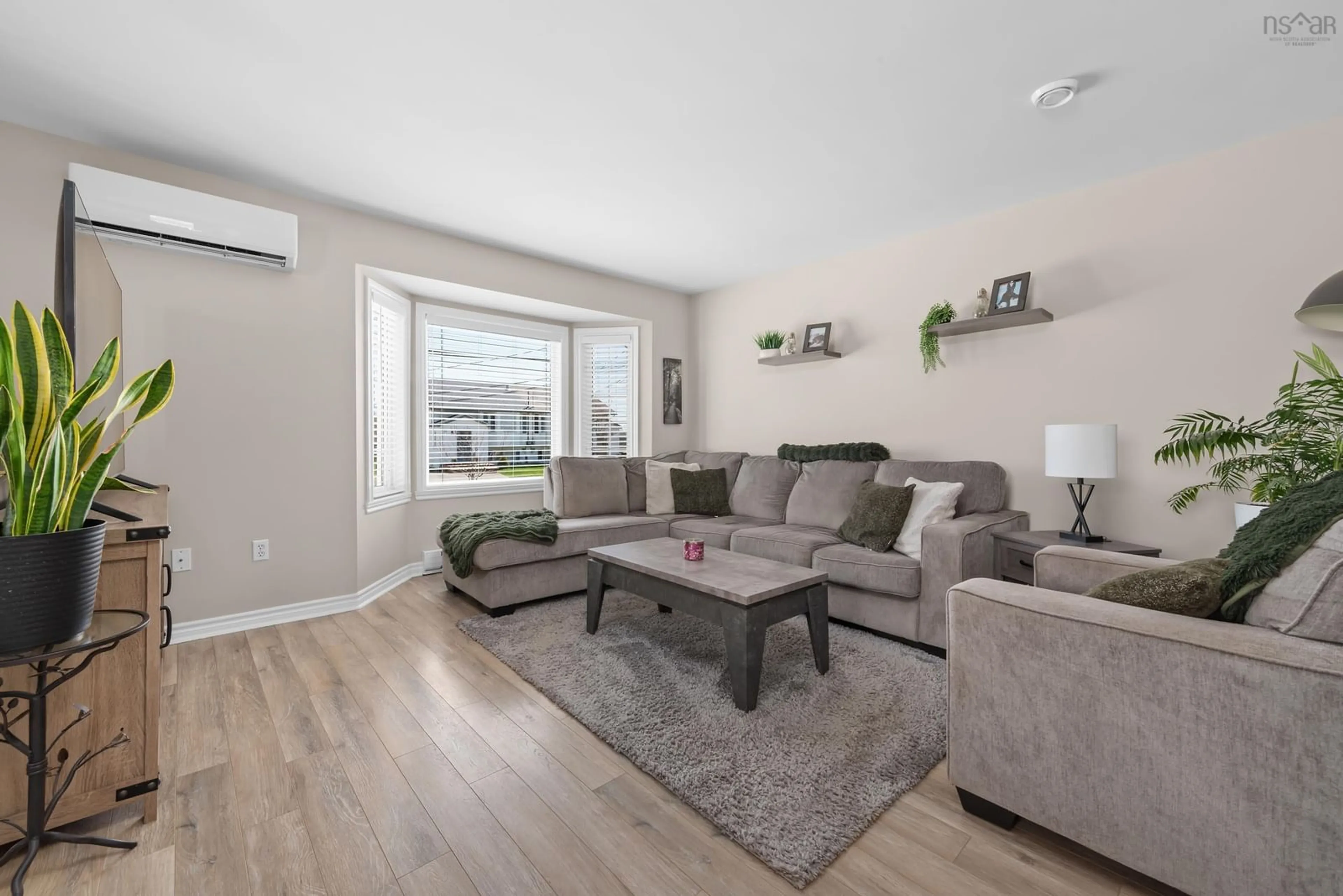Living room with furniture, wood/laminate floor for 20 Peter Crt, Eastern Passage Nova Scotia B3G 1S9