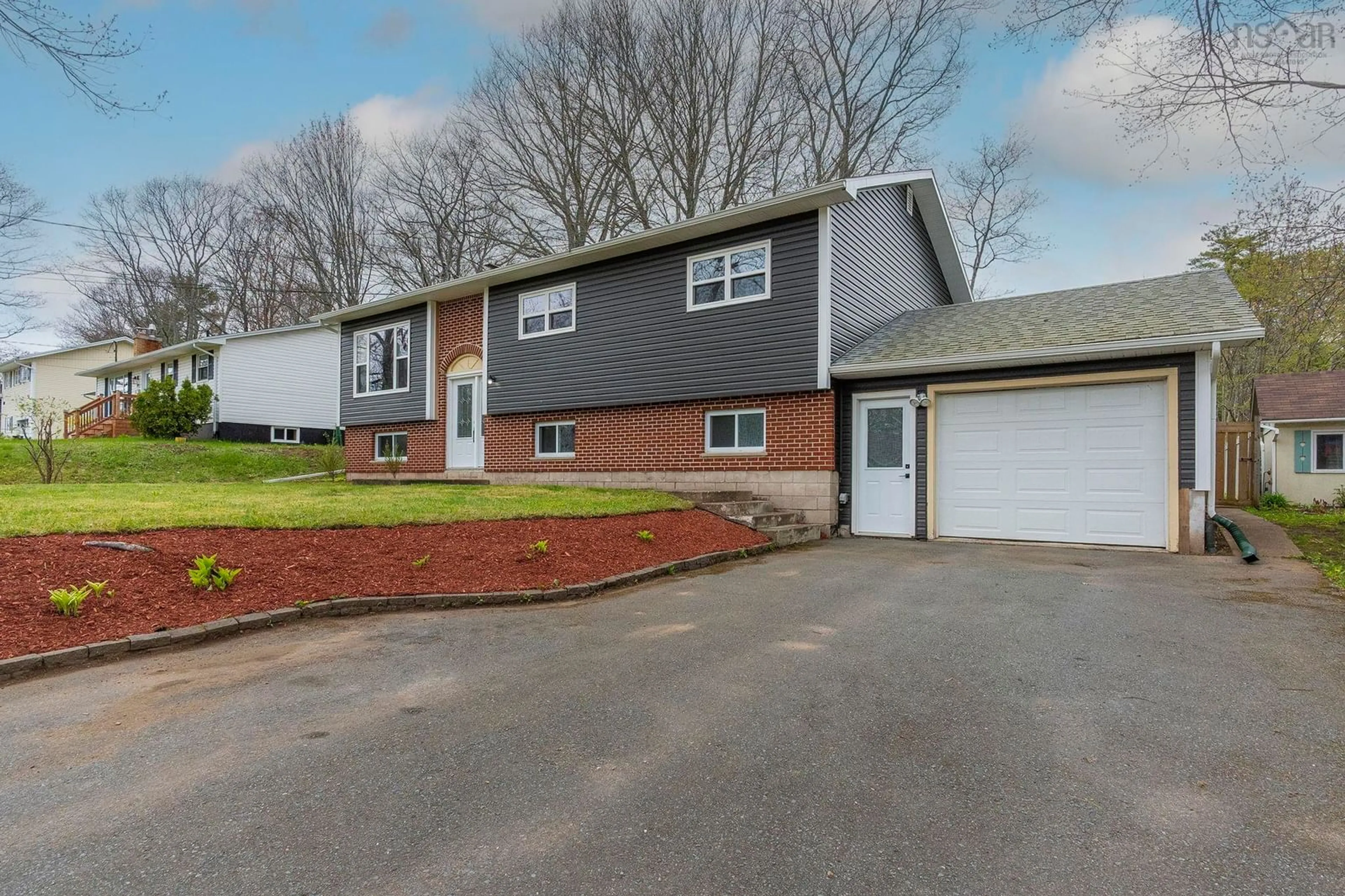 Home with vinyl exterior material, street for 874 Dalmation Dr, Greenwood Nova Scotia B0P 1R0
