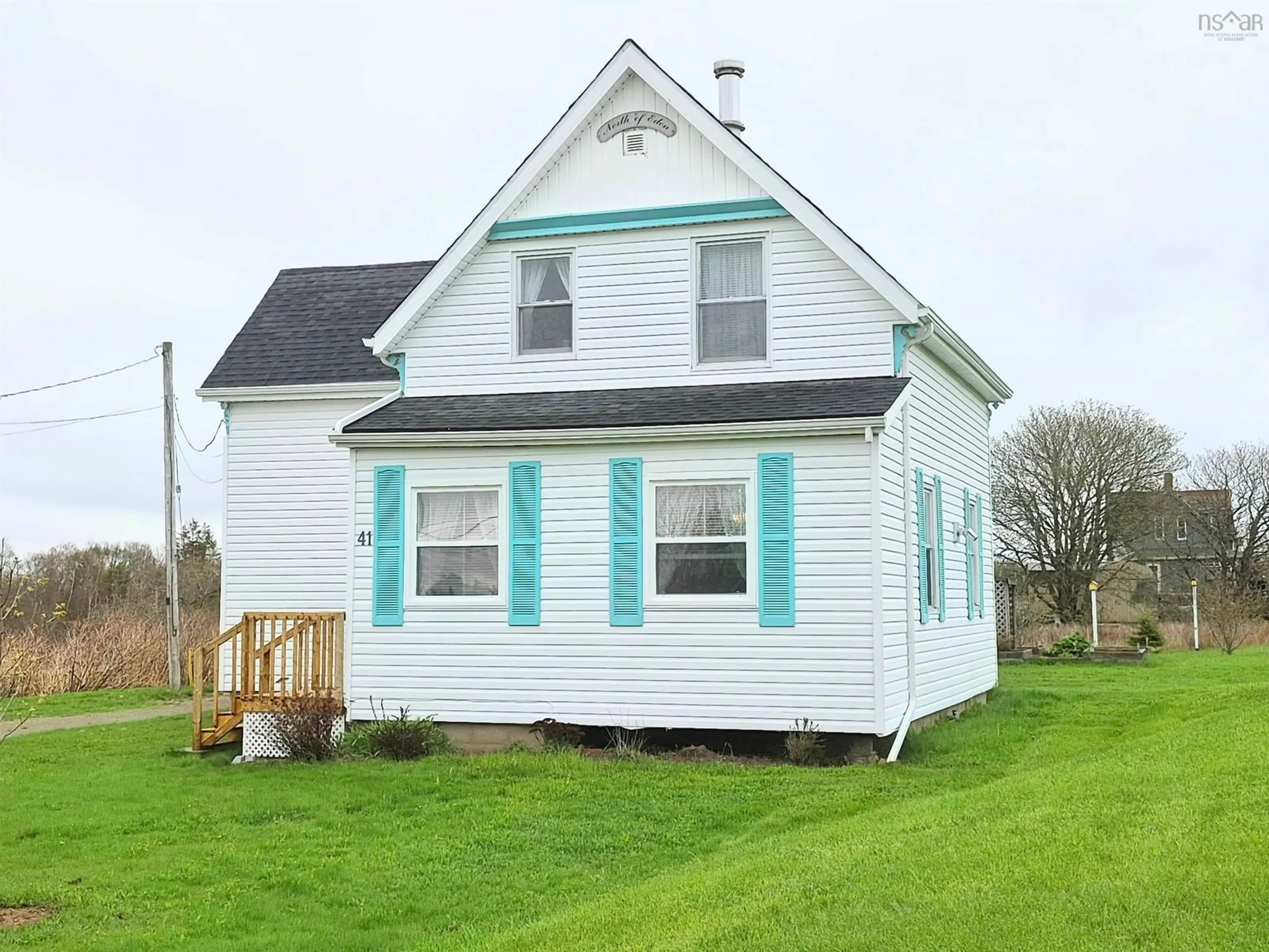 Home with vinyl exterior material, street for 41 242 Hwy, Joggins Nova Scotia B0L 1A0