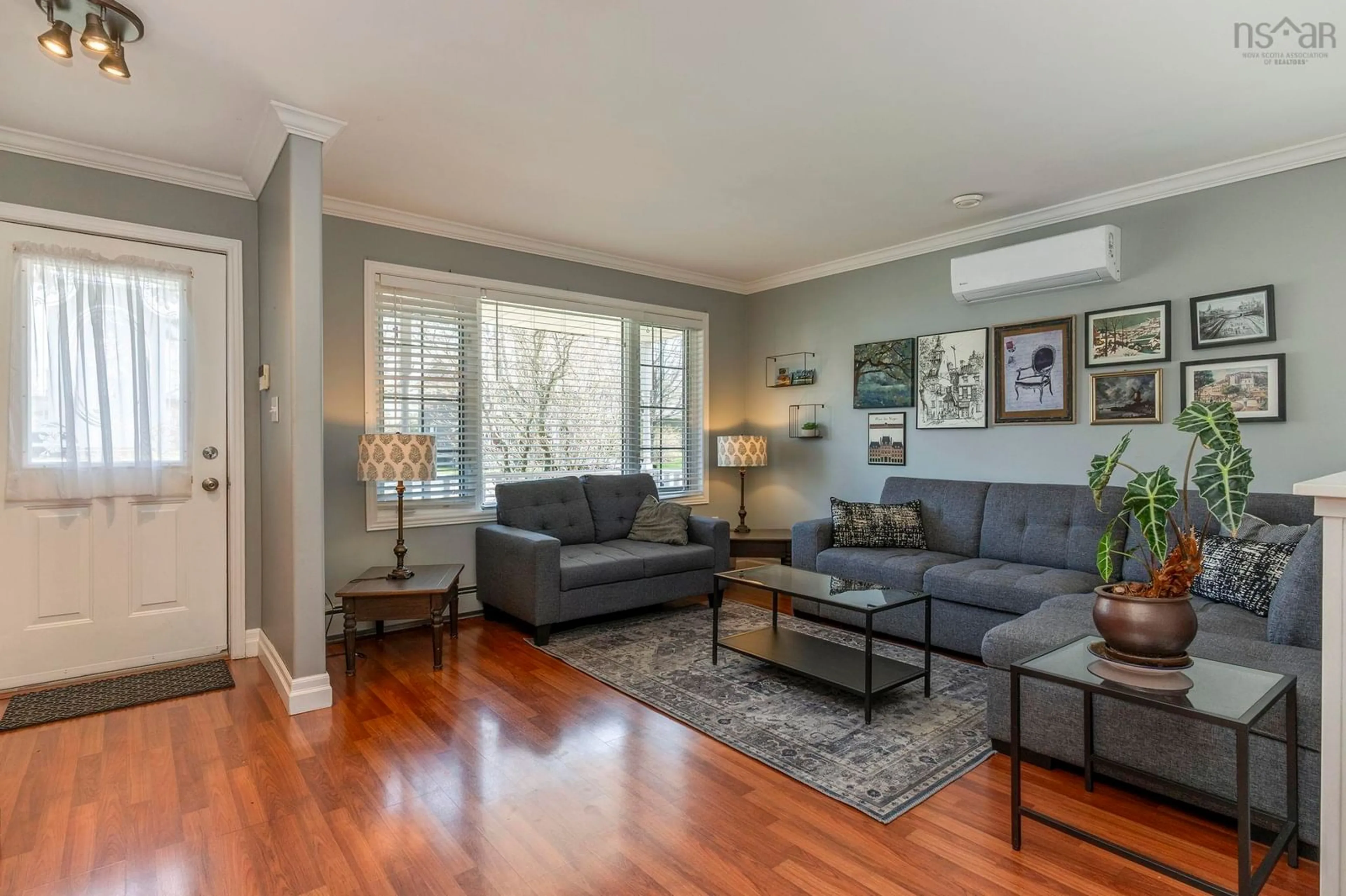 Living room with furniture, wood/laminate floor for 119 Douglas Cres, Halifax Nova Scotia B3M 3B6