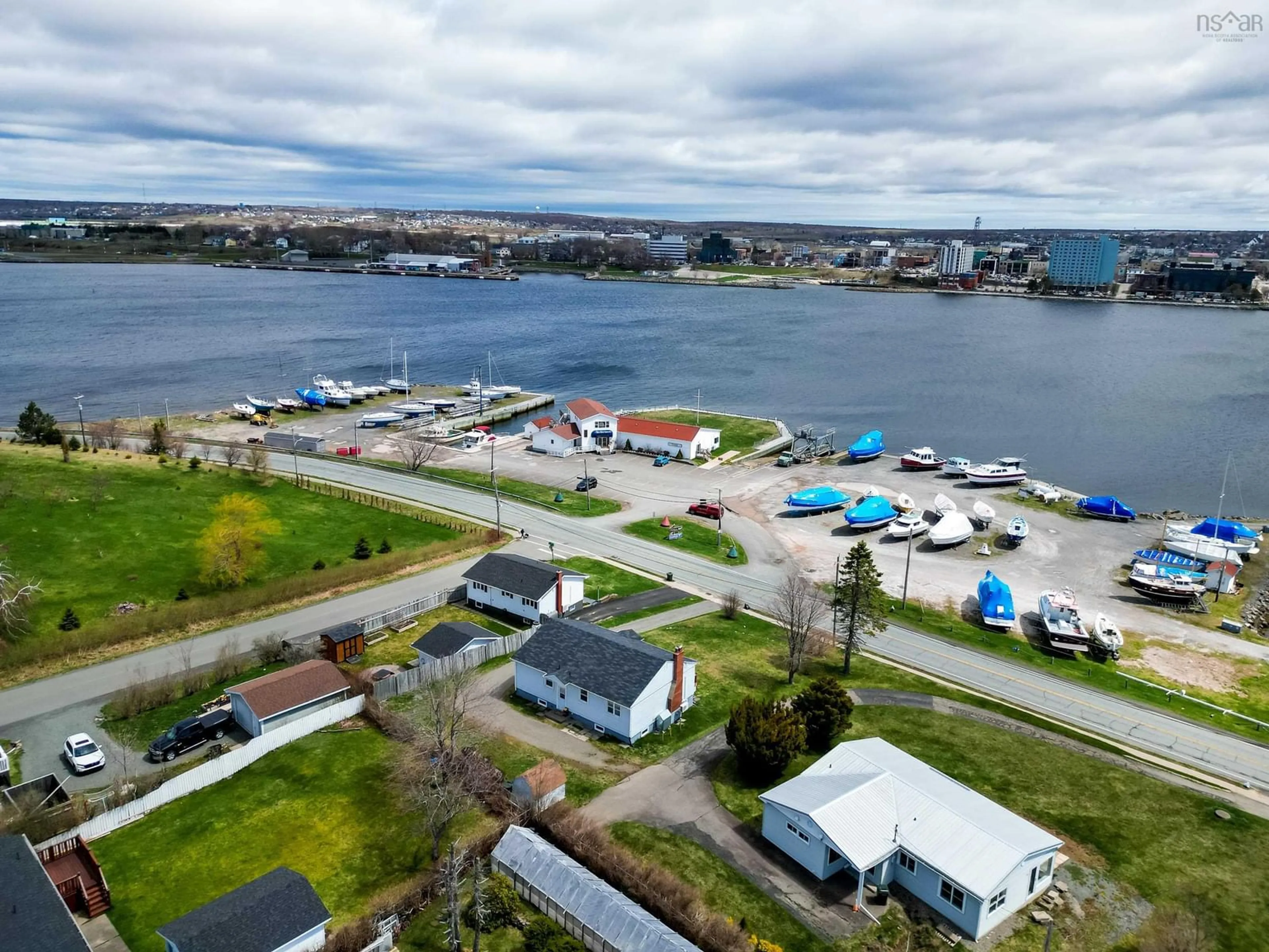 A pic from outside/outdoor area/front of a property/back of a property/a pic from drone, water/lake/river/ocean view for 595 Westmount Rd, Westmount Nova Scotia B1R 1B2