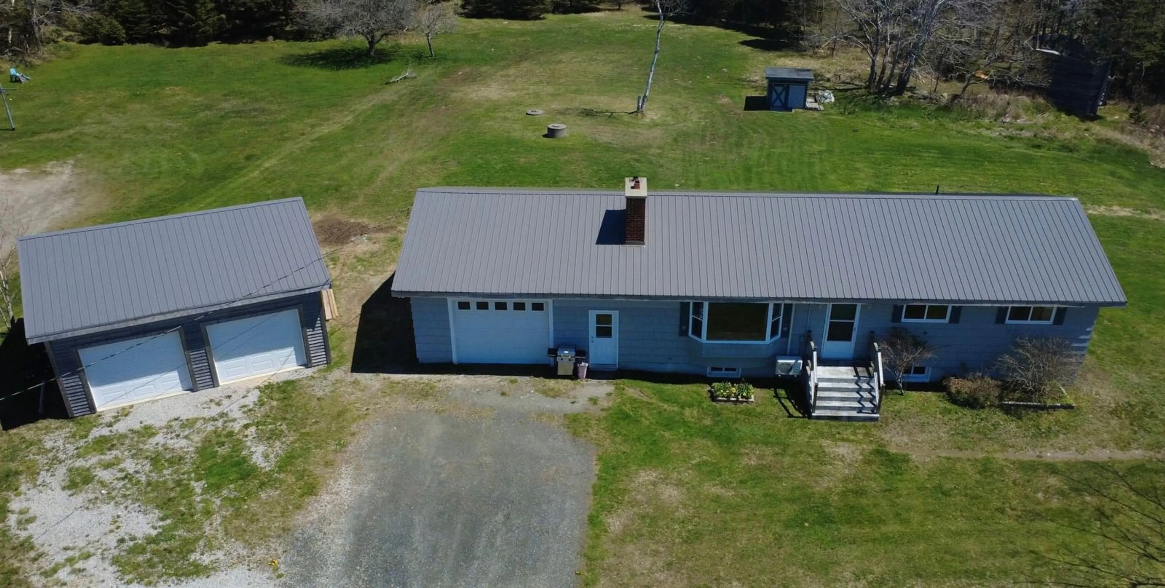 A pic from outside/outdoor area/front of a property/back of a property/a pic from drone, building for 2288 Highway 1, Wellington Nova Scotia B5A 5A8