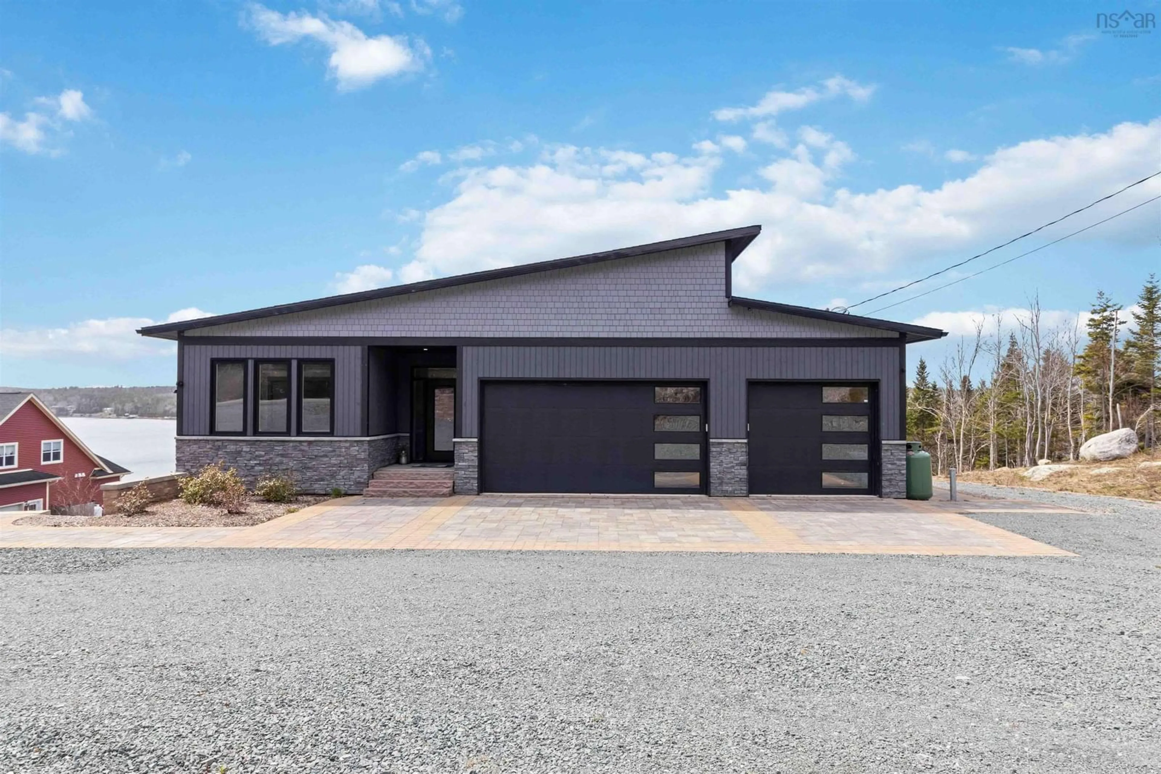 Home with vinyl exterior material, street for 398 East Petpeswick Rd, East Petpeswick Nova Scotia B0J 2L0