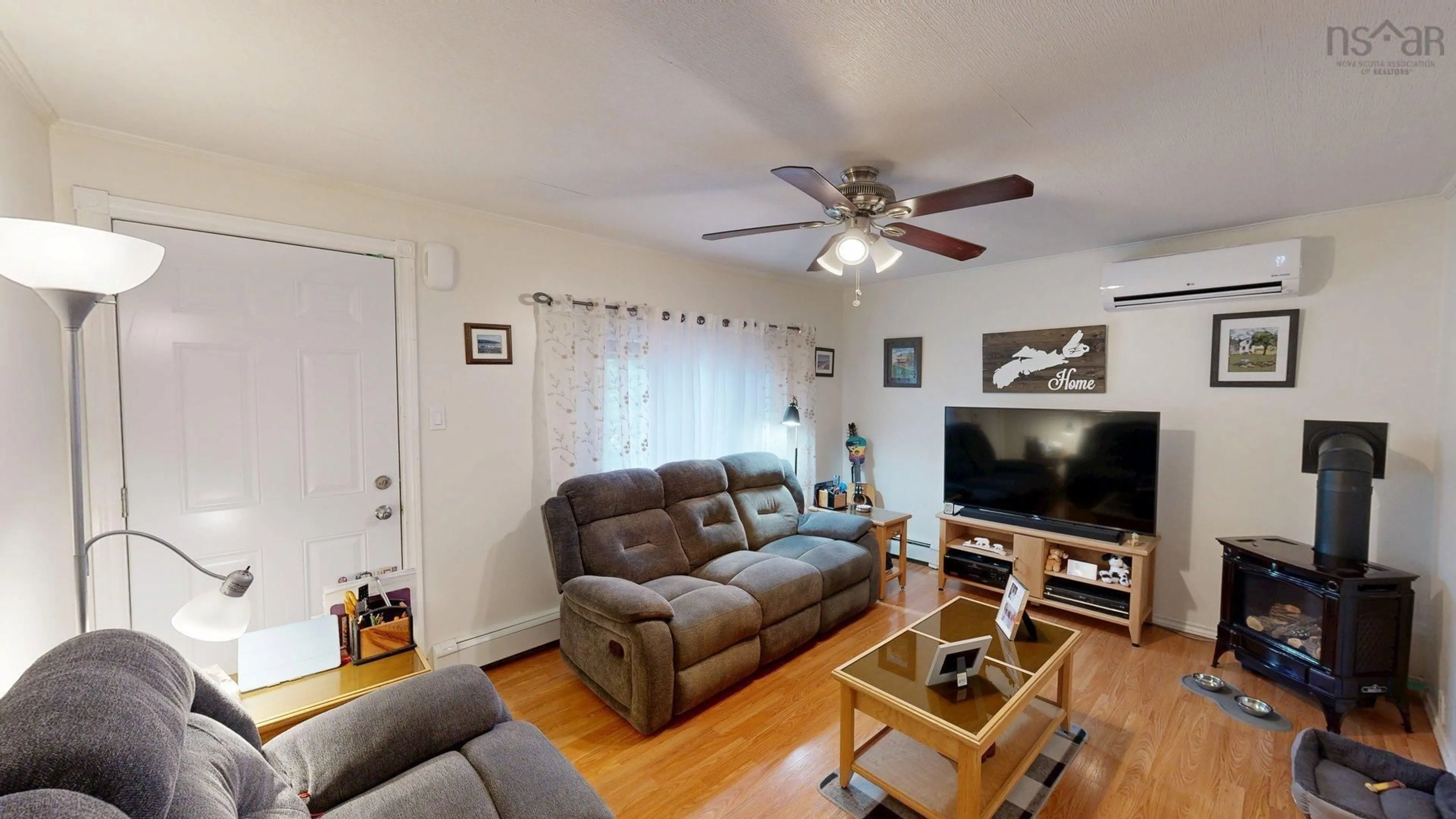 Living room with furniture, unknown for 3095 Macleod Ave, River Ryan Nova Scotia B1H 1J6