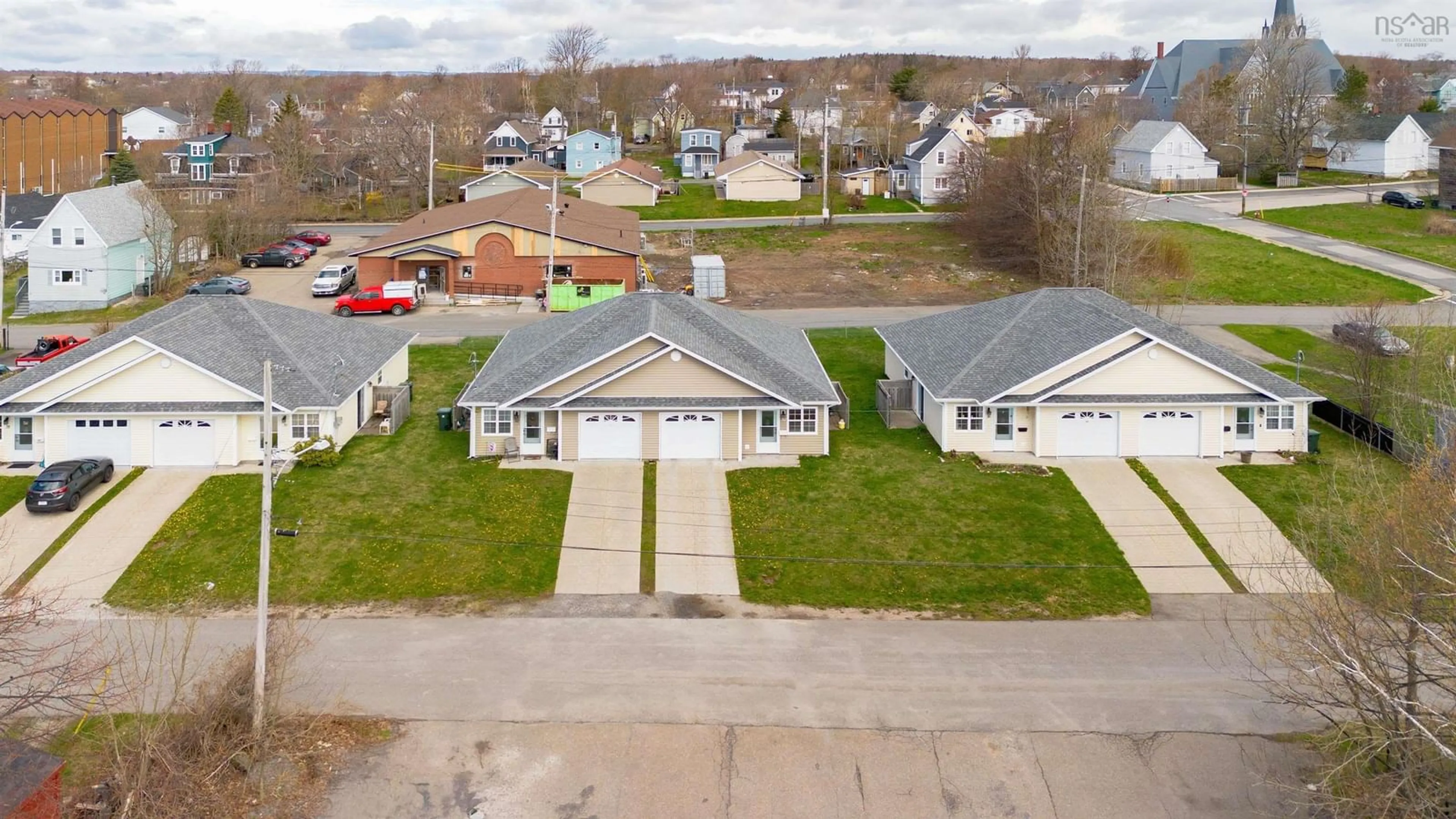 A pic from outside/outdoor area/front of a property/back of a property/a pic from drone, street for 28 George St, North Sydney Nova Scotia B2A 1J3
