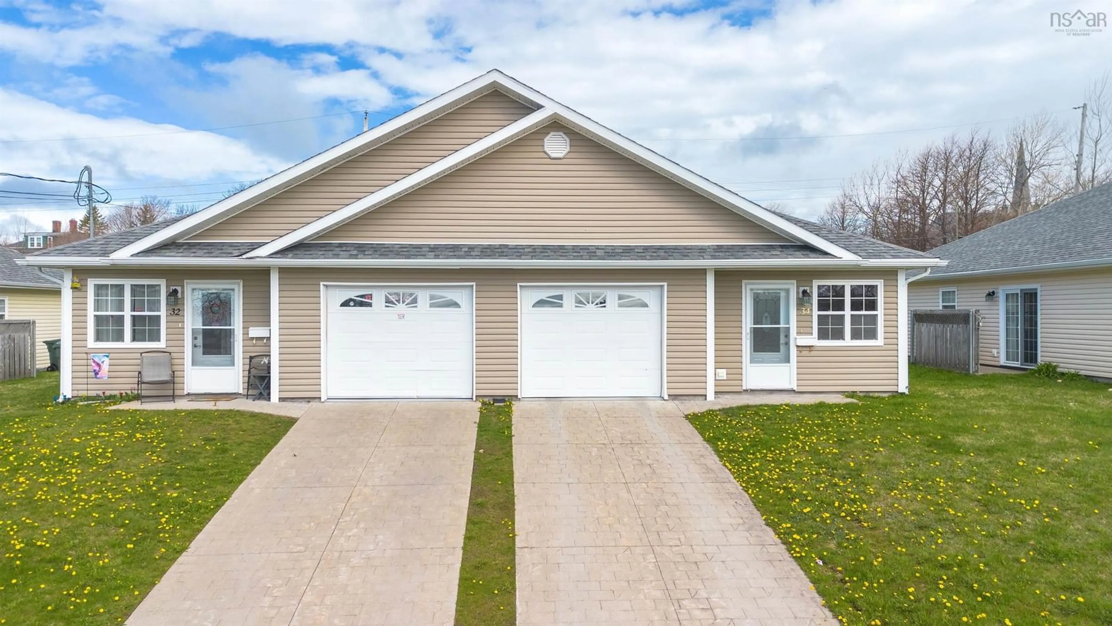 Home with vinyl exterior material, street for 28 George St, North Sydney Nova Scotia B2A 1J3