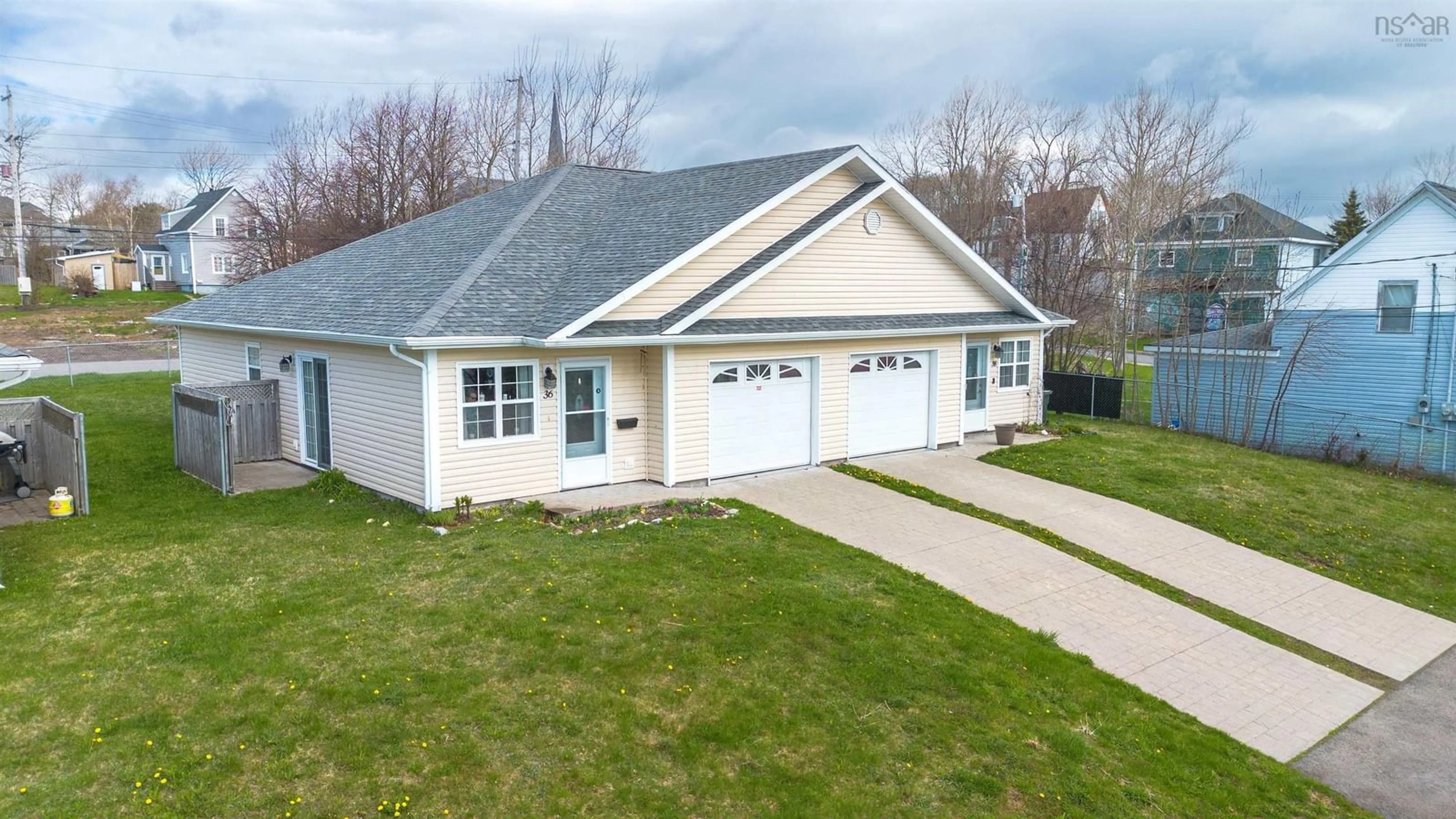 Home with vinyl exterior material, unknown for 28 George St, North Sydney Nova Scotia B2A 1J3