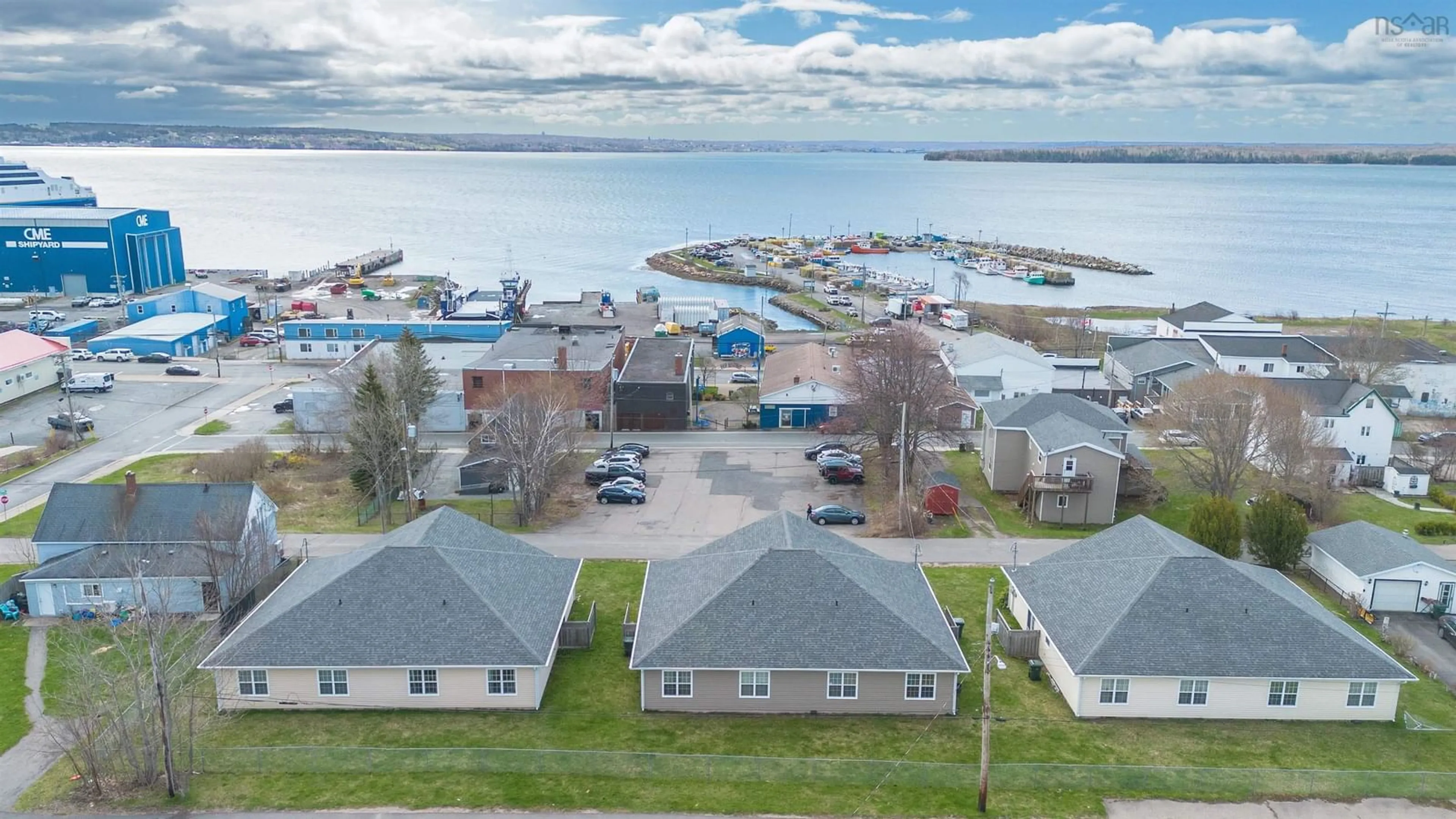 A pic from outside/outdoor area/front of a property/back of a property/a pic from drone, water/lake/river/ocean view for 28 George St, North Sydney Nova Scotia B2A 1J3