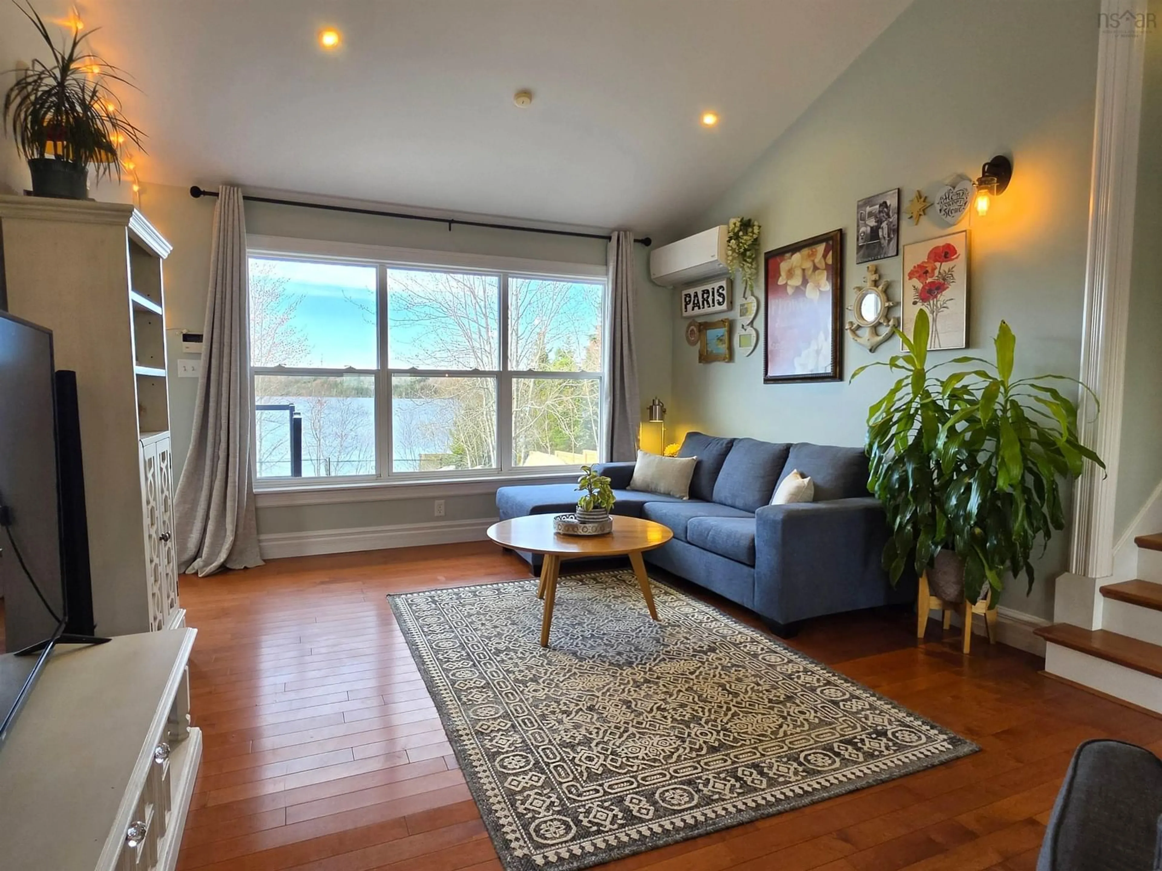 Living room with furniture, wood/laminate floor for 34 Lakeridge Cres, Colby South Nova Scotia B2V 2V2