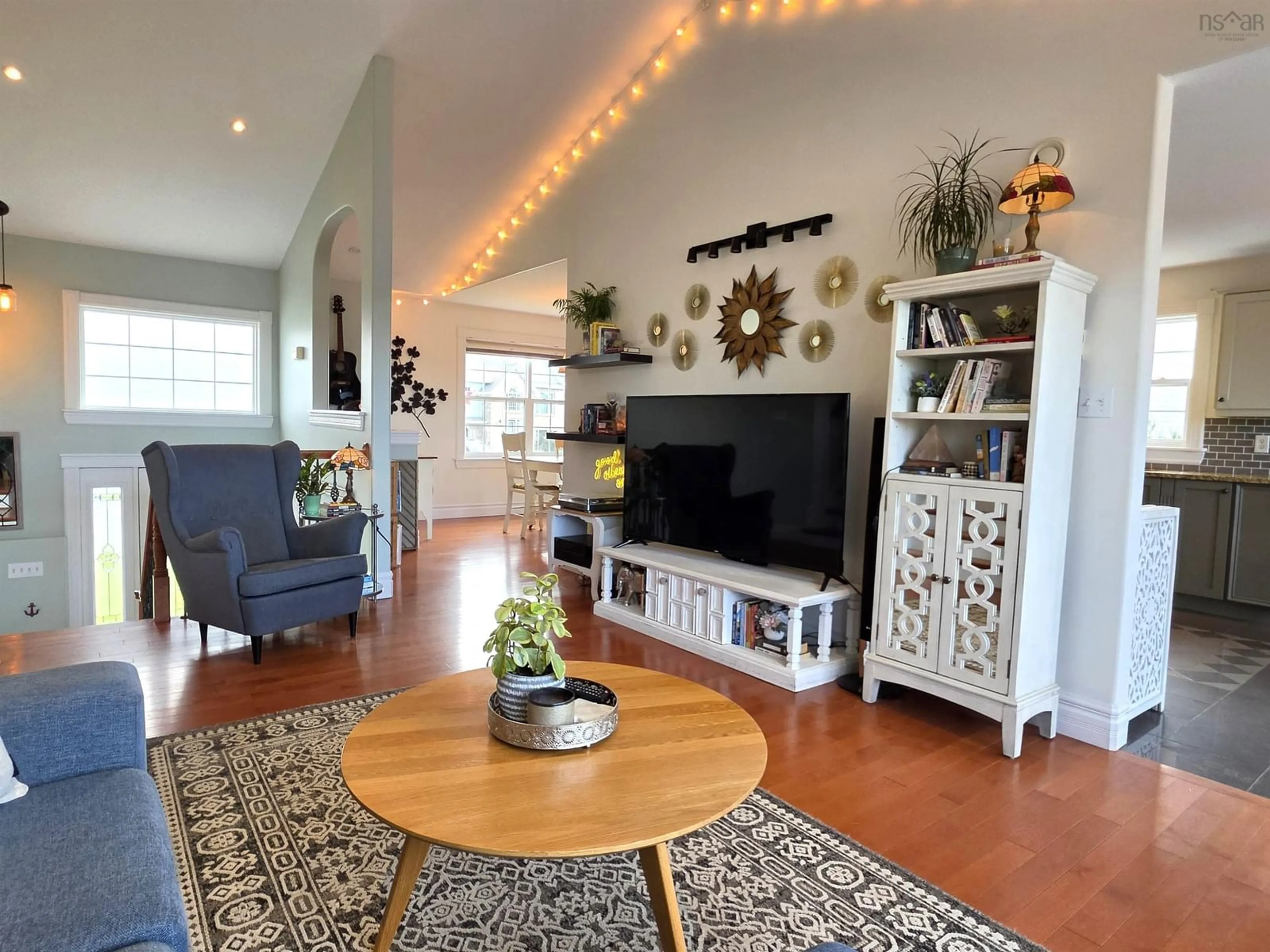 Living room with furniture, wood/laminate floor for 34 Lakeridge Cres, Colby South Nova Scotia B2V 2V2