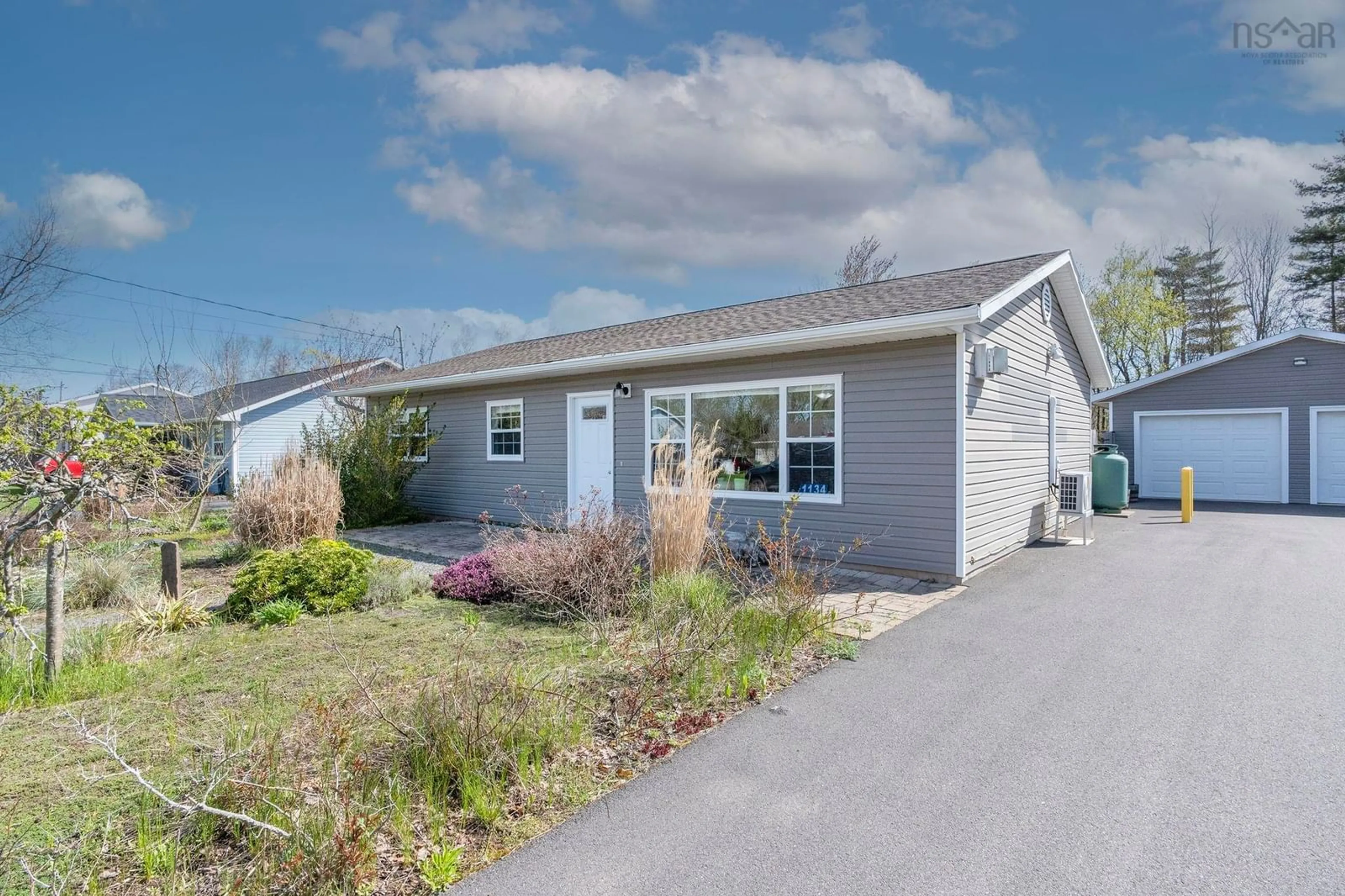 Home with vinyl exterior material, street for 1134 Andringa Dr, Cambridge Nova Scotia B0P 1G0