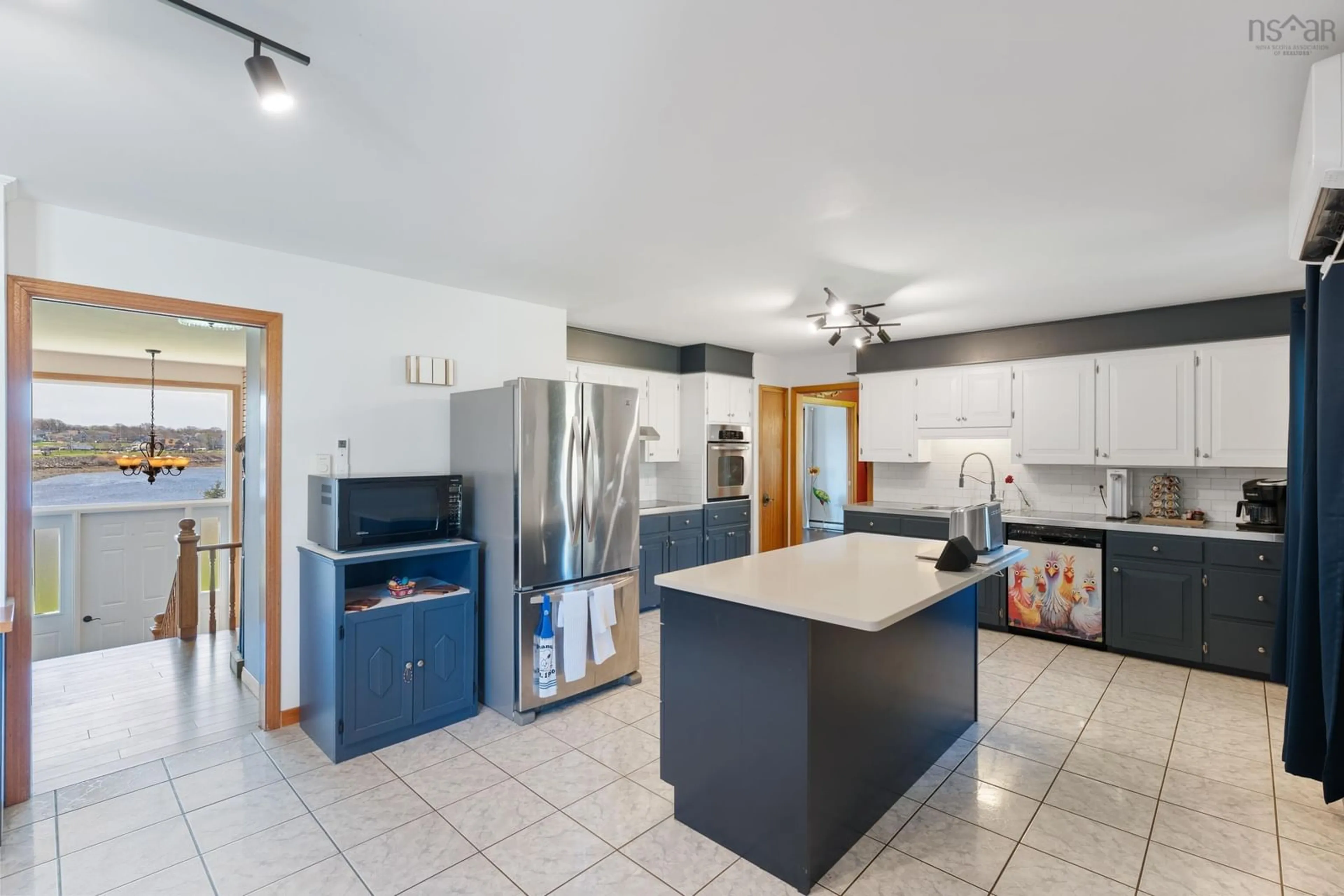 Open concept kitchen, ceramic/tile floor for 18-20 Harbourview Dr, Yarmouth Nova Scotia B5A 4C3