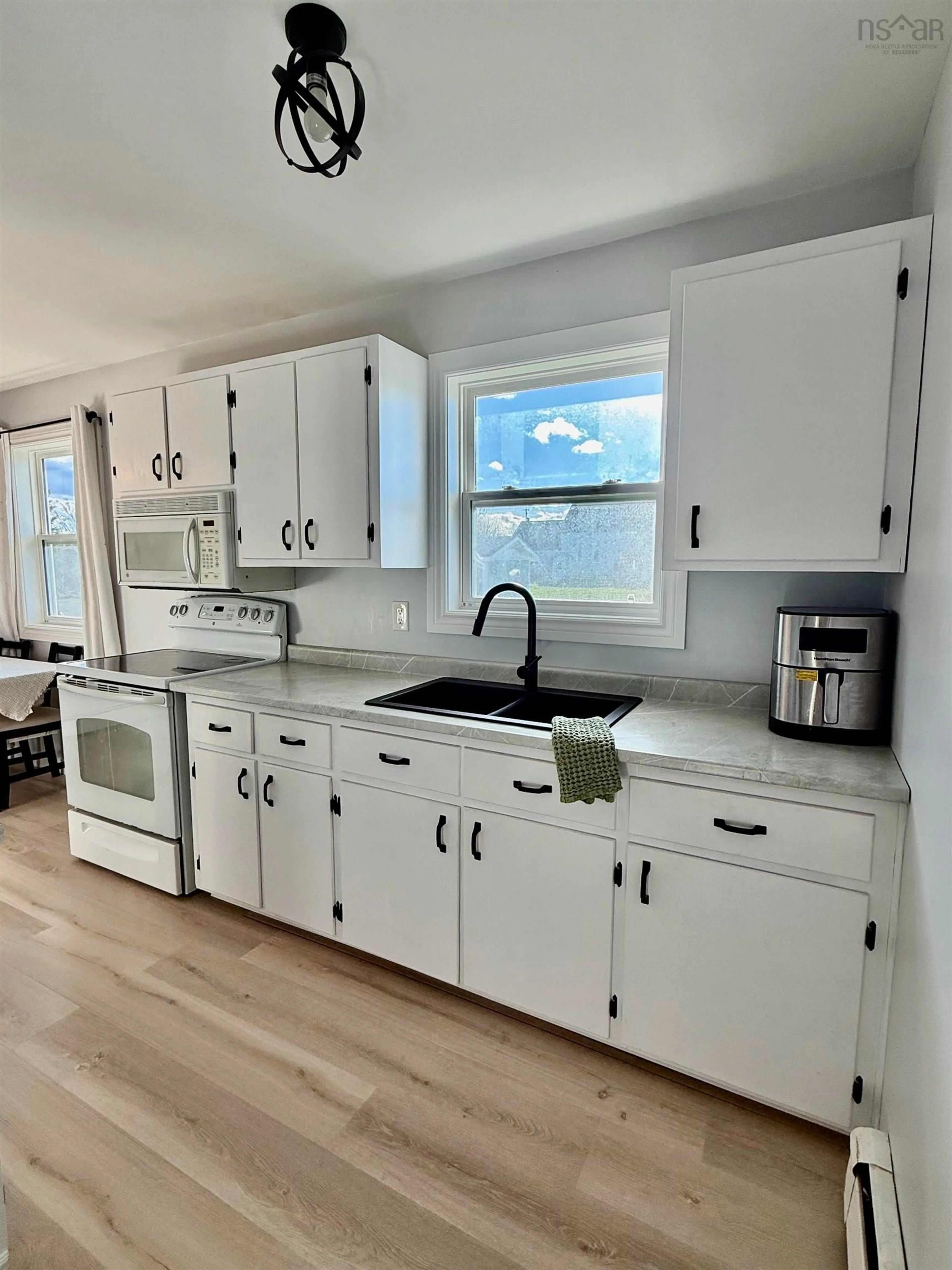 Open concept kitchen, unknown for 733 Sharpes Lane, New Waterford Nova Scotia B1H 4H1
