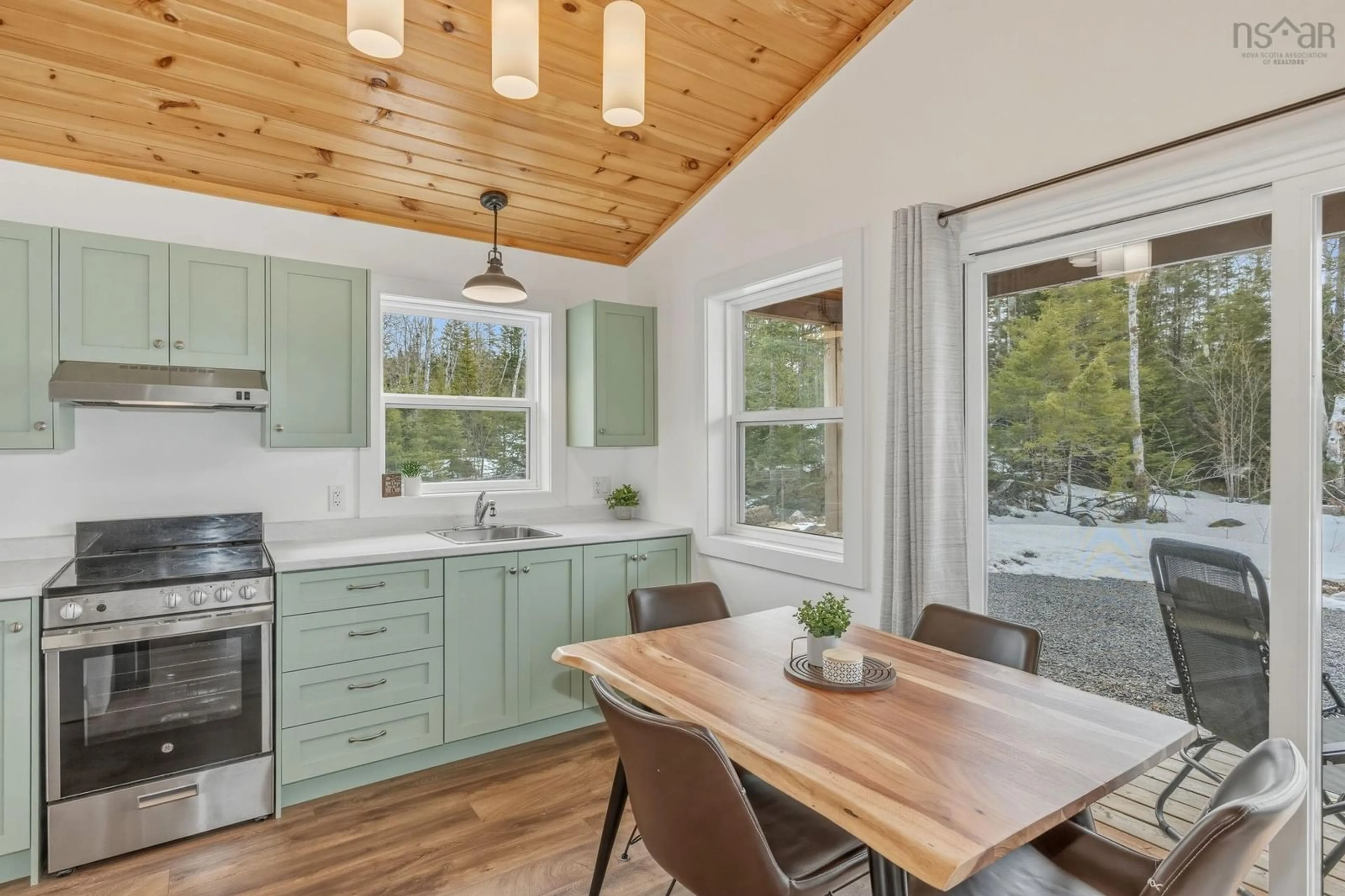 Open concept kitchen, wood/laminate floor for 366 Loon Lake Dr, Lake Paul Nova Scotia B0P 1C0