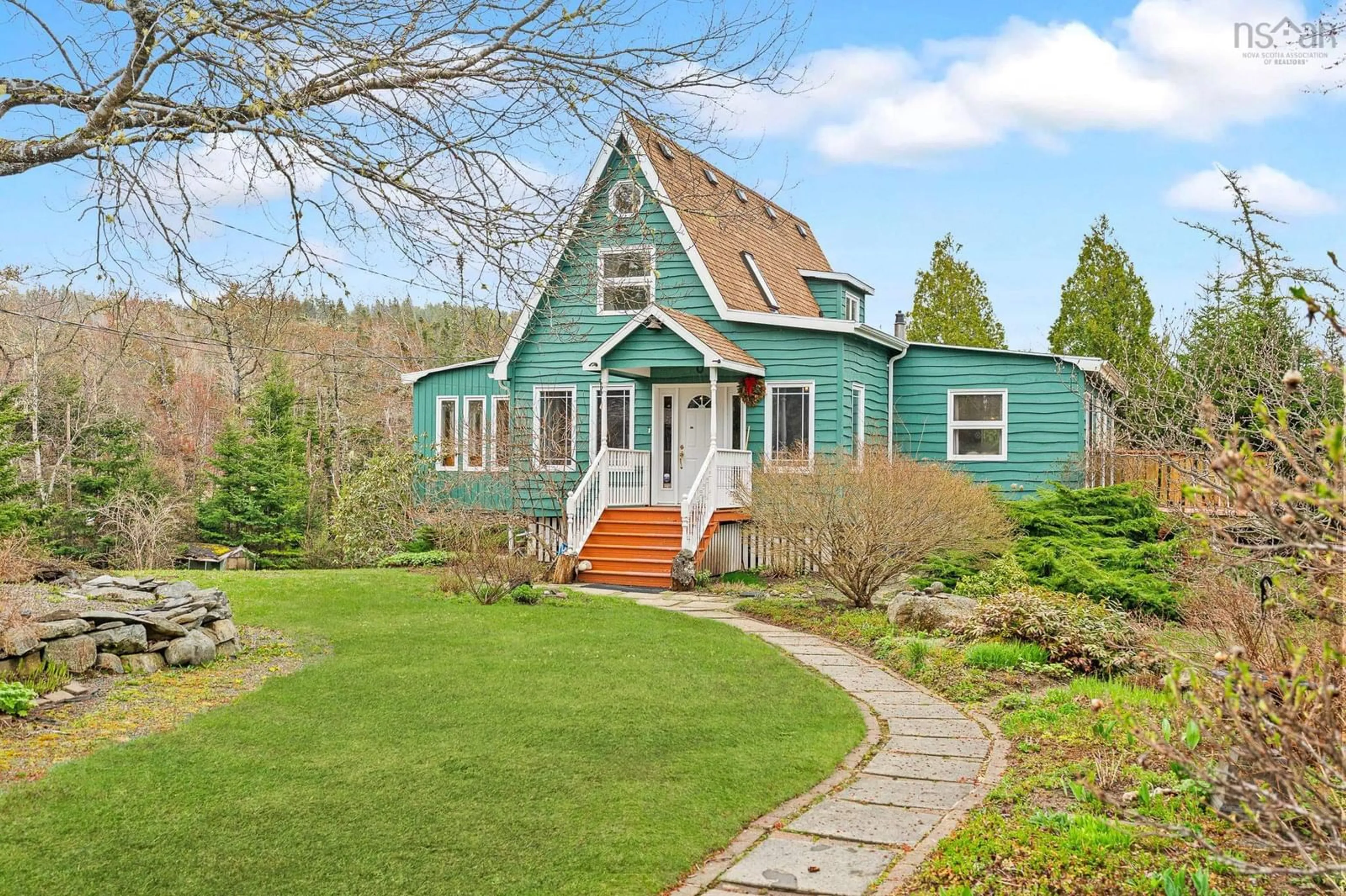 Home with vinyl exterior material, street for 11028 Highway 7, Lake Charlotte Nova Scotia B0J 1Y0