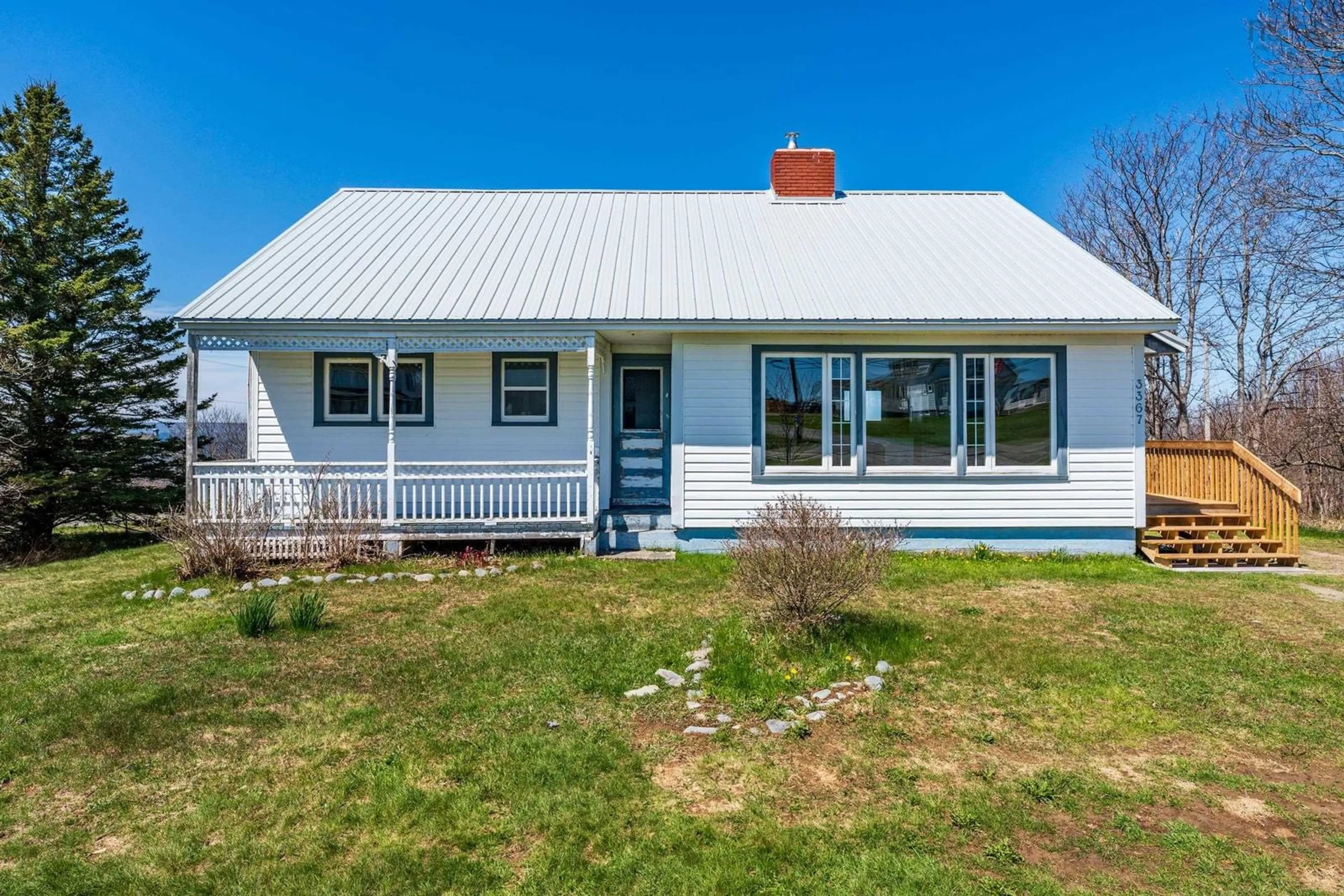 Home with vinyl exterior material, street for 3367 Highway 1, Belliveaus Cove Nova Scotia B0W 3T0