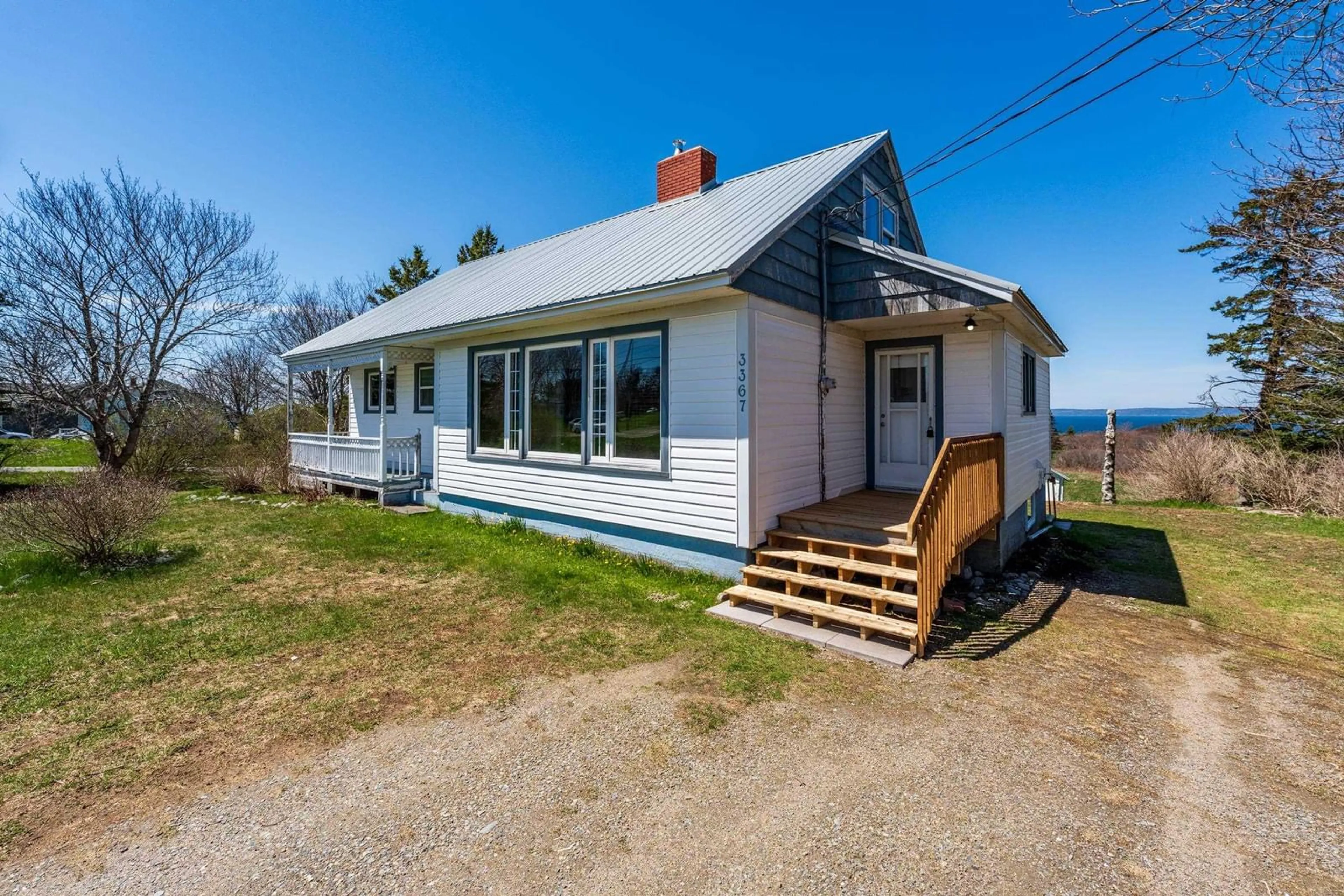 A pic from outside/outdoor area/front of a property/back of a property/a pic from drone, building for 3367 Highway 1, Belliveaus Cove Nova Scotia B0W 3T0