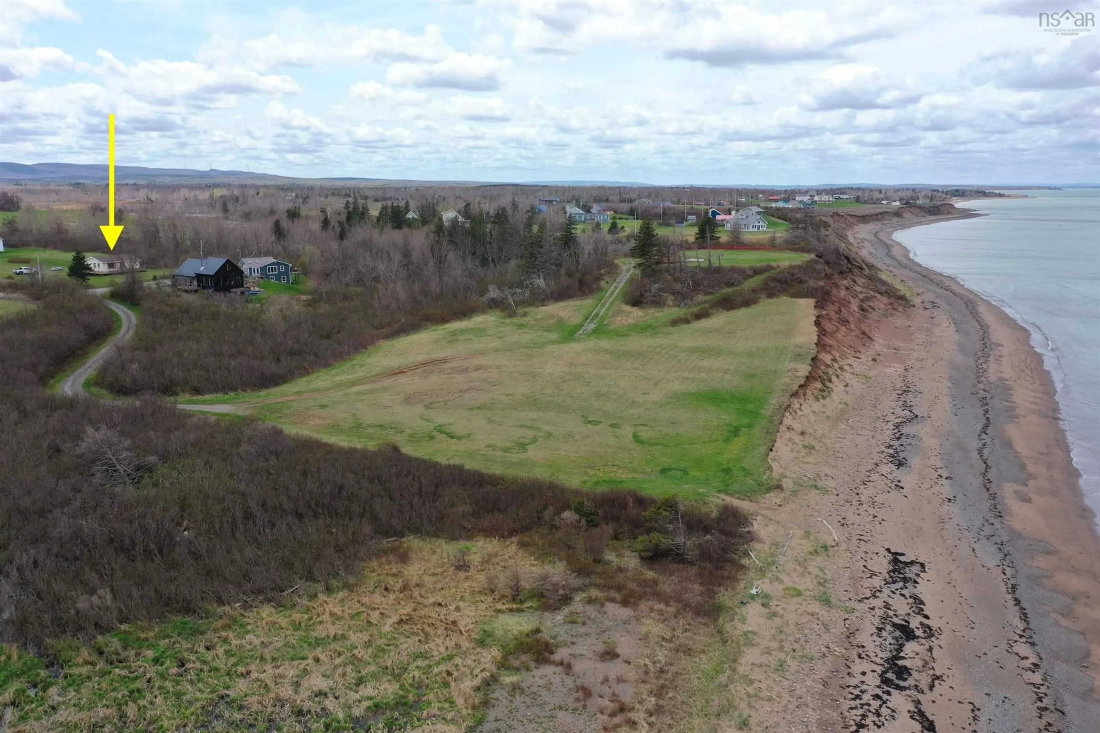 A pic from outside/outdoor area/front of a property/back of a property/a pic from drone, water/lake/river/ocean view for 105 Murdocks Lane, Ponds Nova Scotia B0K 1G0