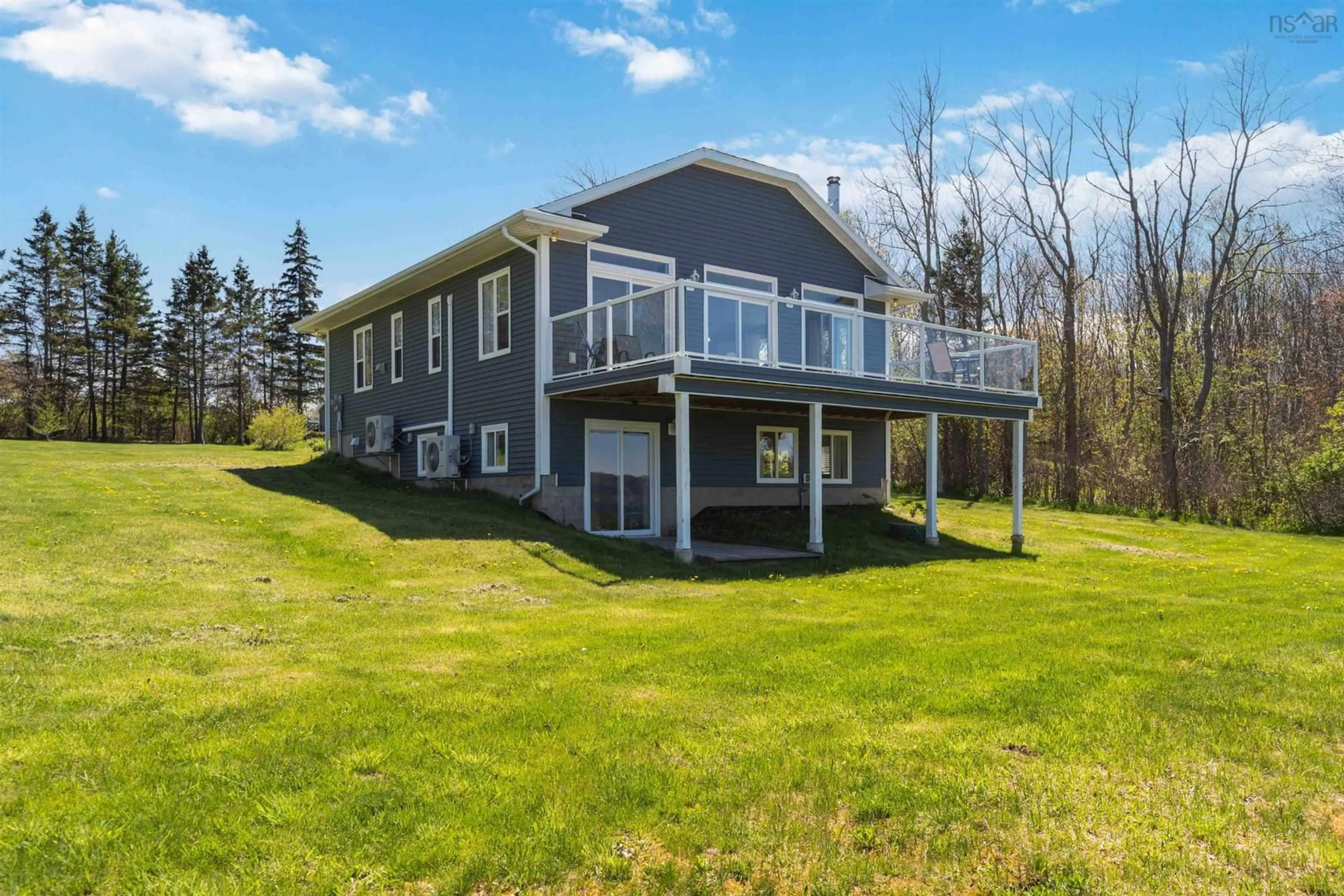 A pic from outside/outdoor area/front of a property/back of a property/a pic from drone, water/lake/river/ocean view for 38 Shore Dr, Deep Brook Nova Scotia B0S 1J0