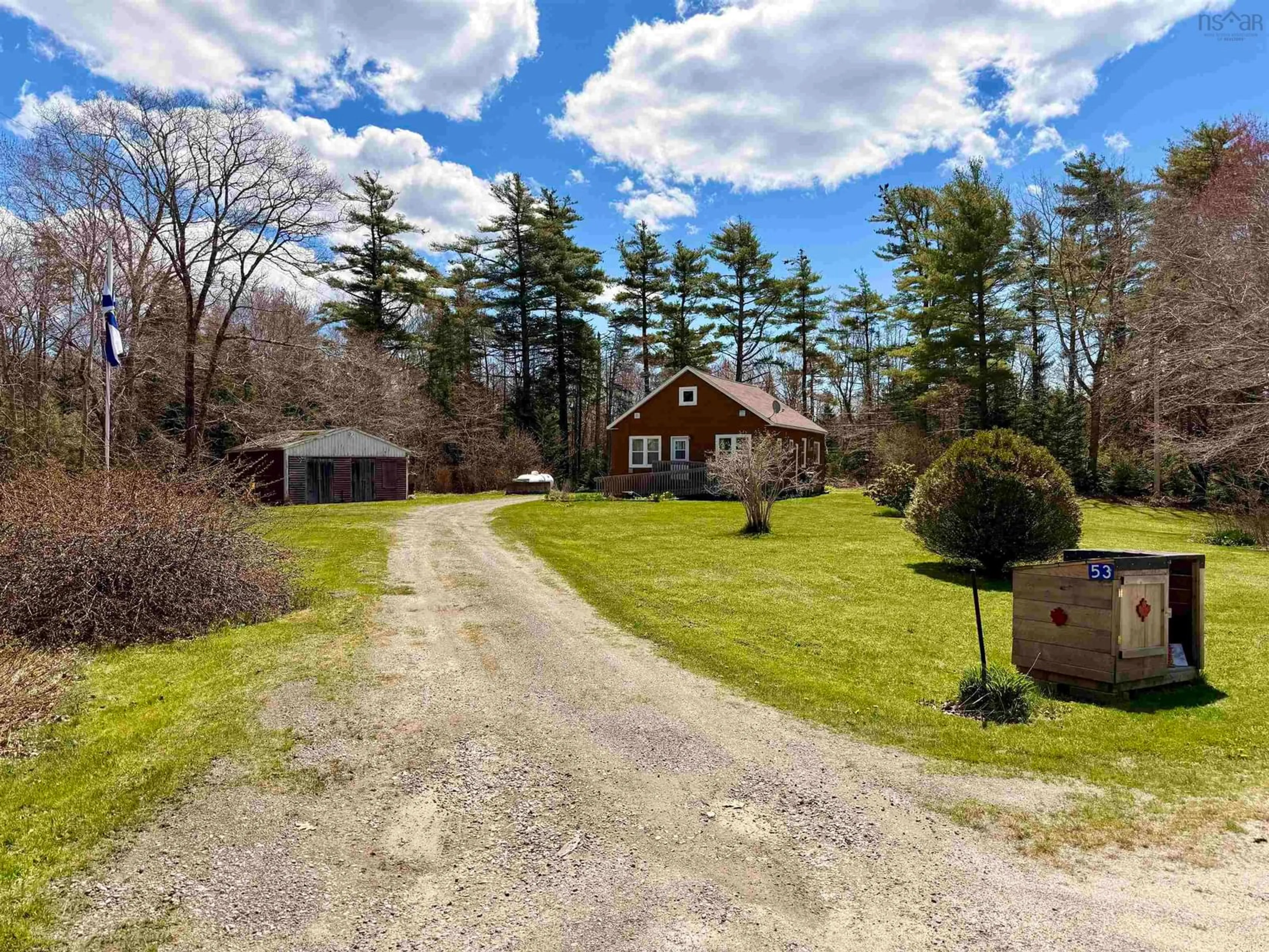 A pic from outside/outdoor area/front of a property/back of a property/a pic from drone, unknown for 53 East Sable Rd, Sable River Nova Scotia B0T 1V0