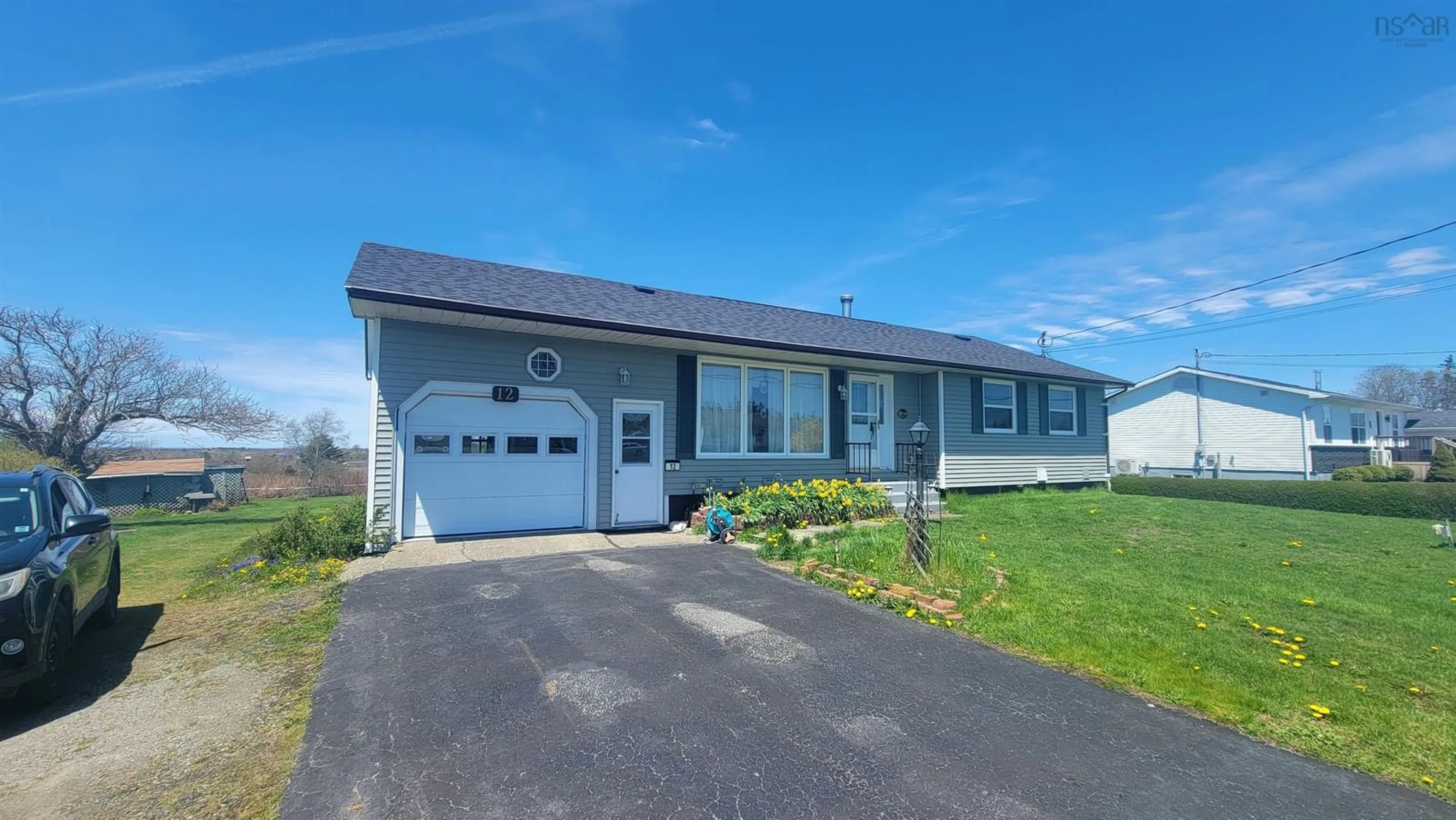 Home with vinyl exterior material, street for 12 Haley Rd, Yarmouth Nova Scotia B5A 5H4
