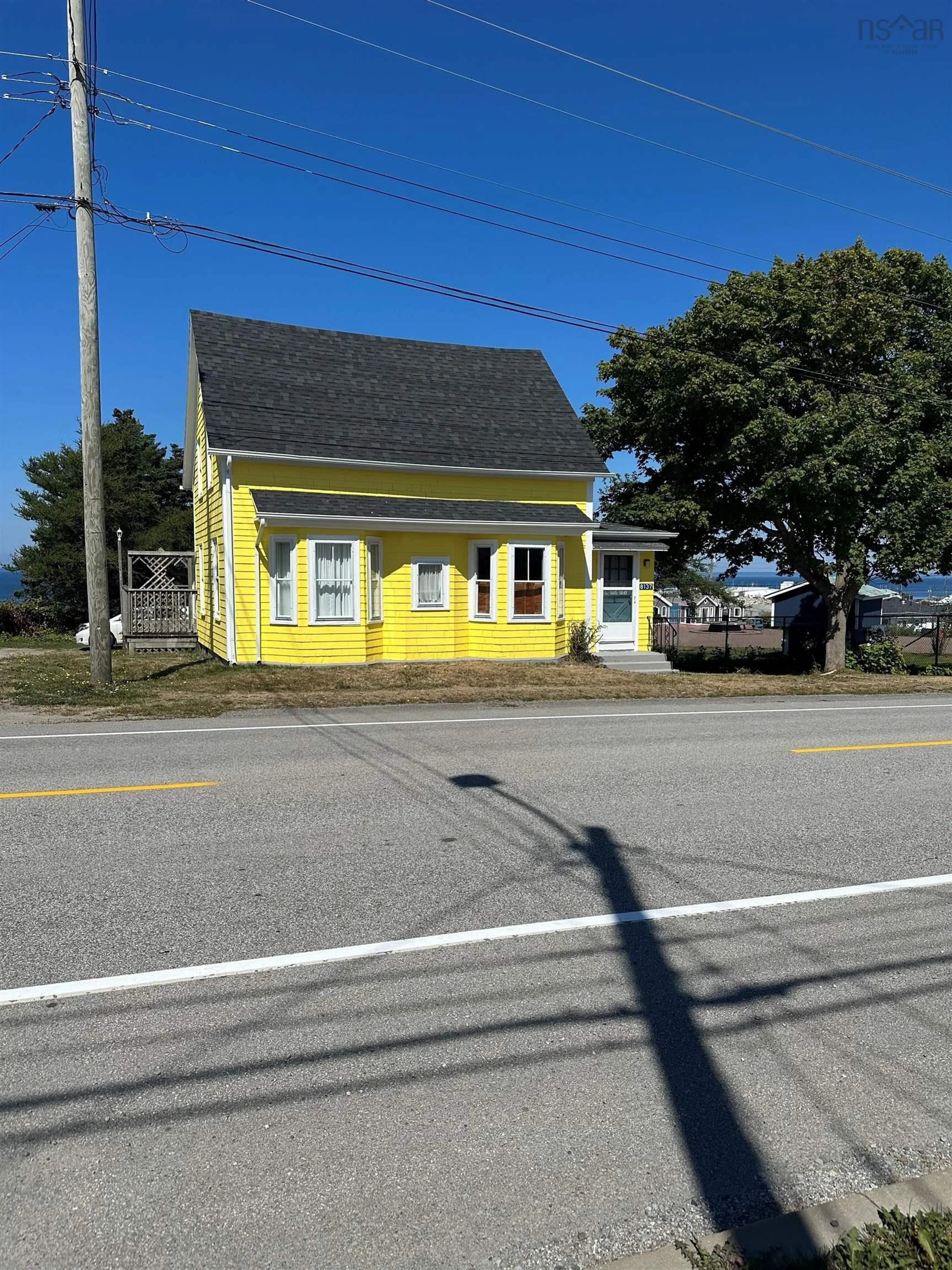 A pic from outside/outdoor area/front of a property/back of a property/a pic from drone, street for 8137 Highway 1, Meteghan Nova Scotia B0W 2J0