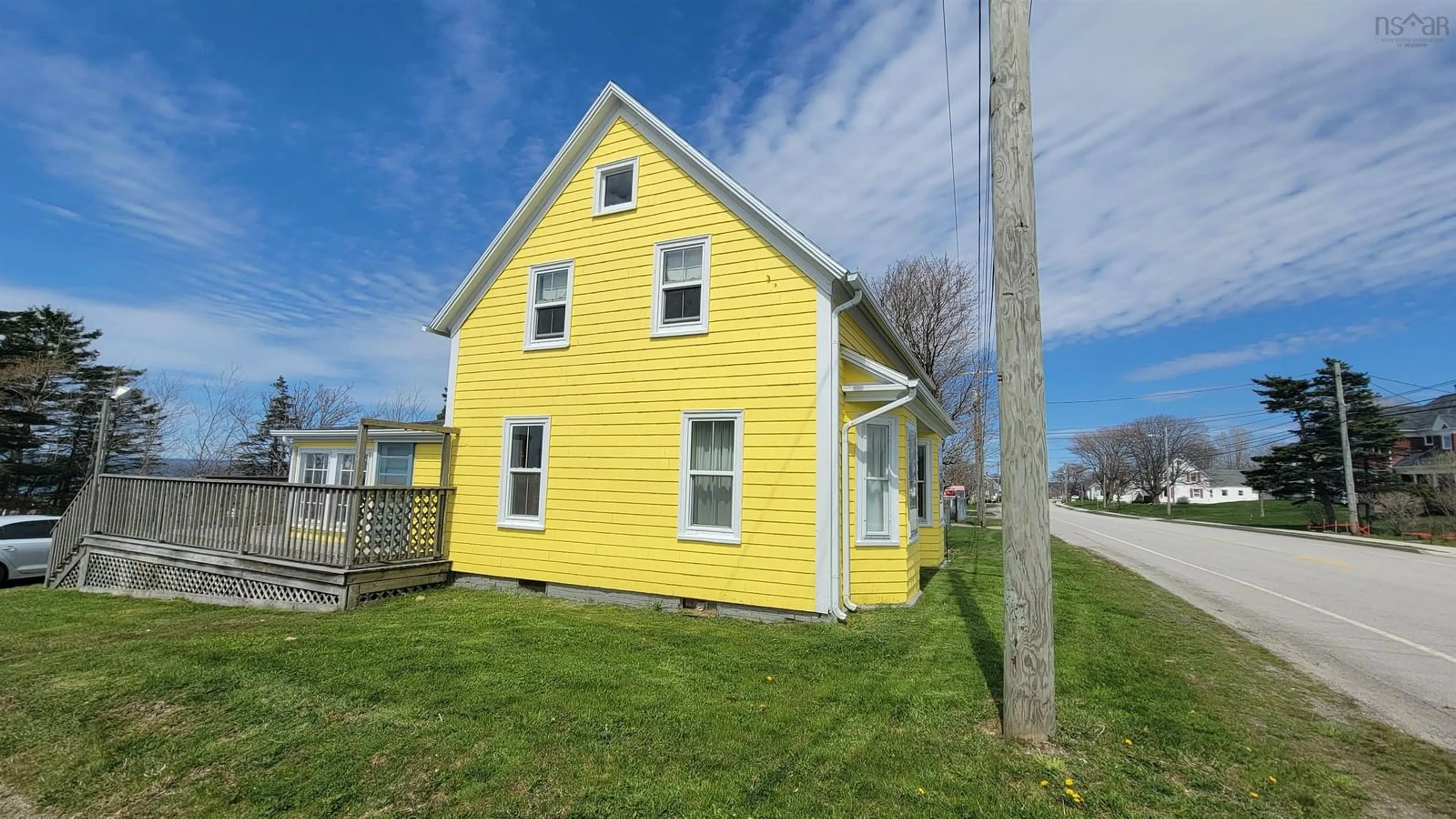 Home with vinyl exterior material, street for 8137 Highway 1, Meteghan Nova Scotia B0W 2J0