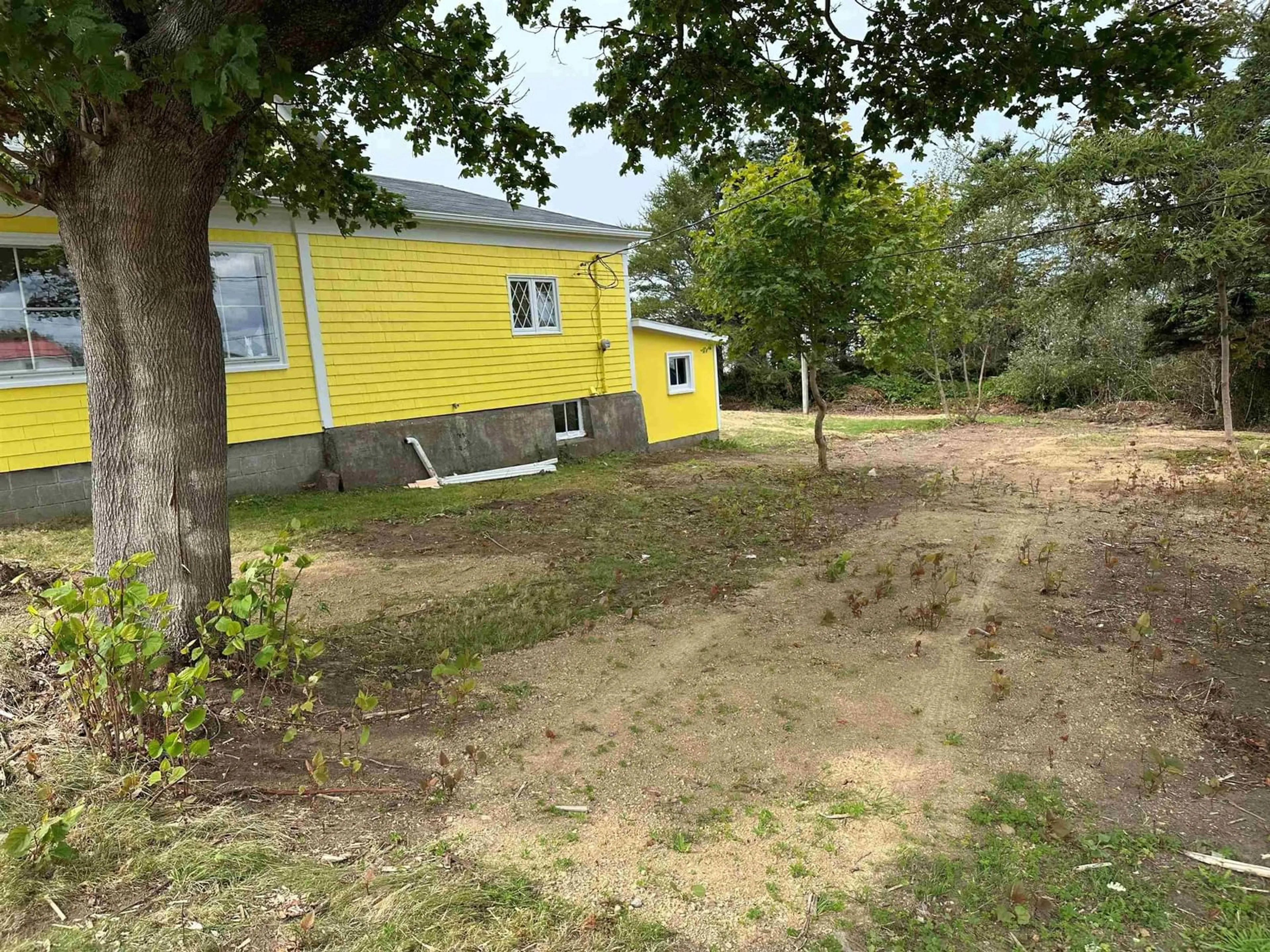 A pic from outside/outdoor area/front of a property/back of a property/a pic from drone, unknown for 8137 Highway 1, Meteghan Nova Scotia B0W 2J0