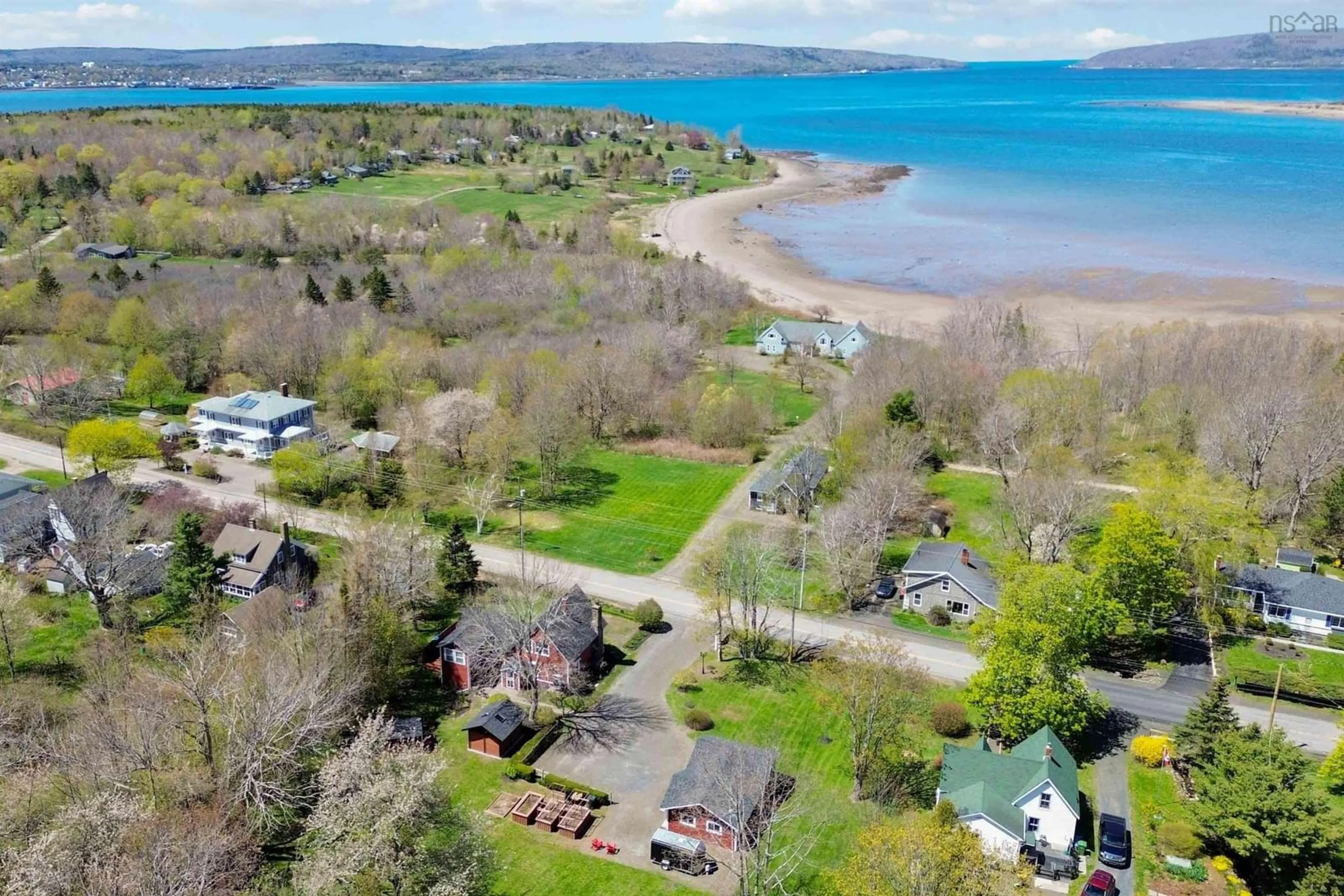 A pic from outside/outdoor area/front of a property/back of a property/a pic from drone, water/lake/river/ocean view for 646 Highway 1, Smiths Cove Nova Scotia B0S 1S0