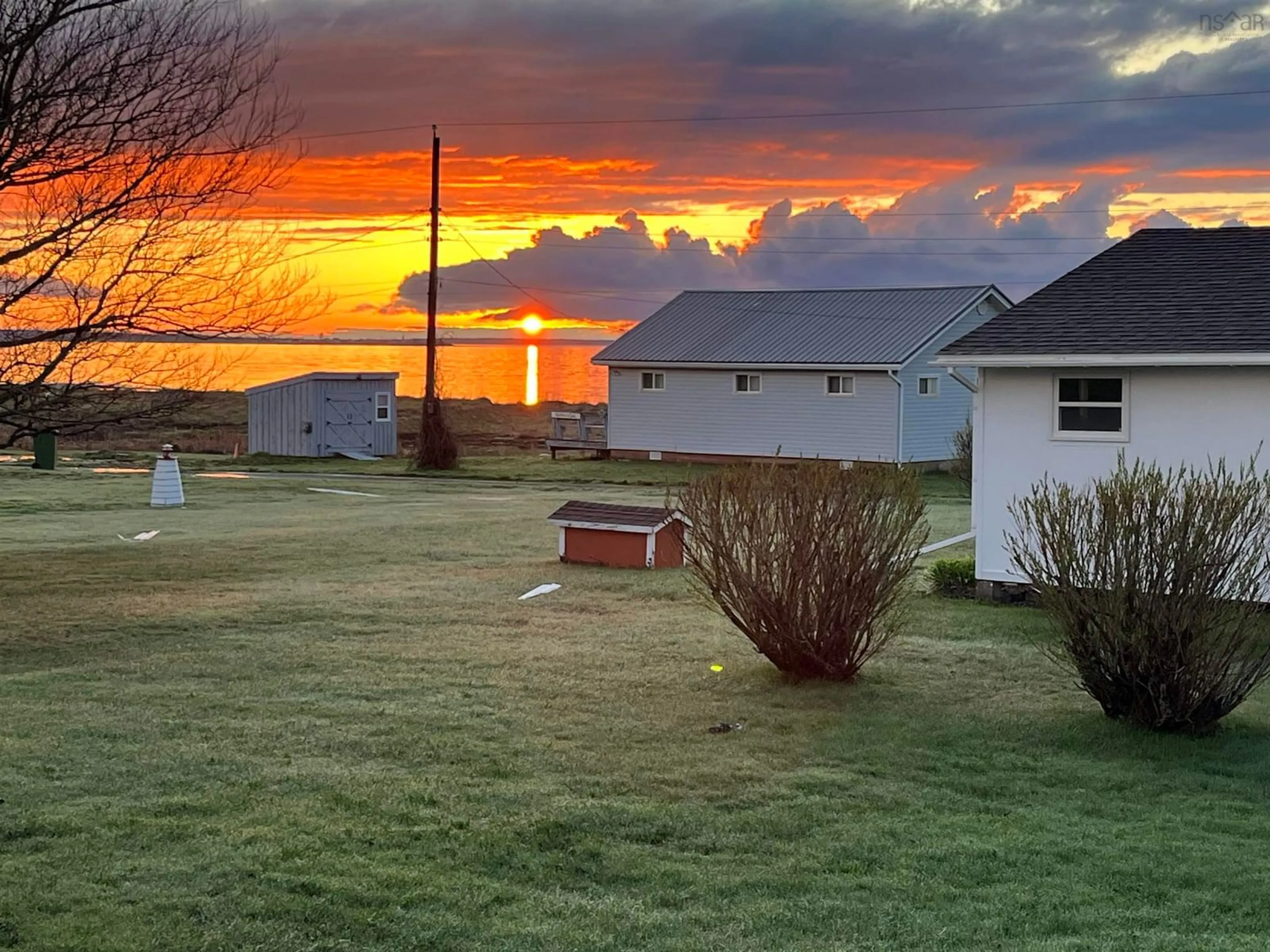 A pic from outside/outdoor area/front of a property/back of a property/a pic from drone, water/lake/river/ocean view for 6 Douglas Cres, Marshville Nova Scotia B0K 1N0